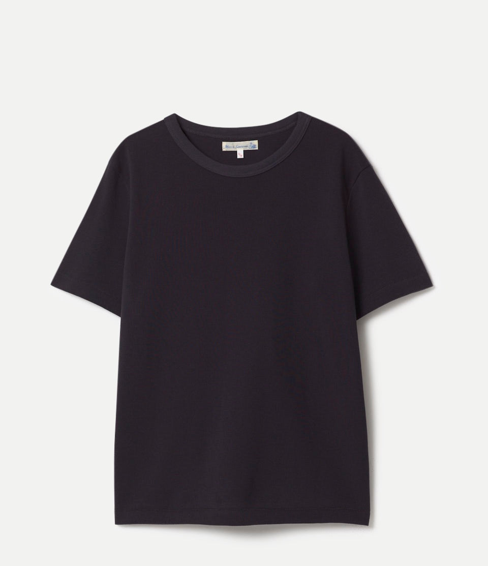 Black t-shirt on a light gray background