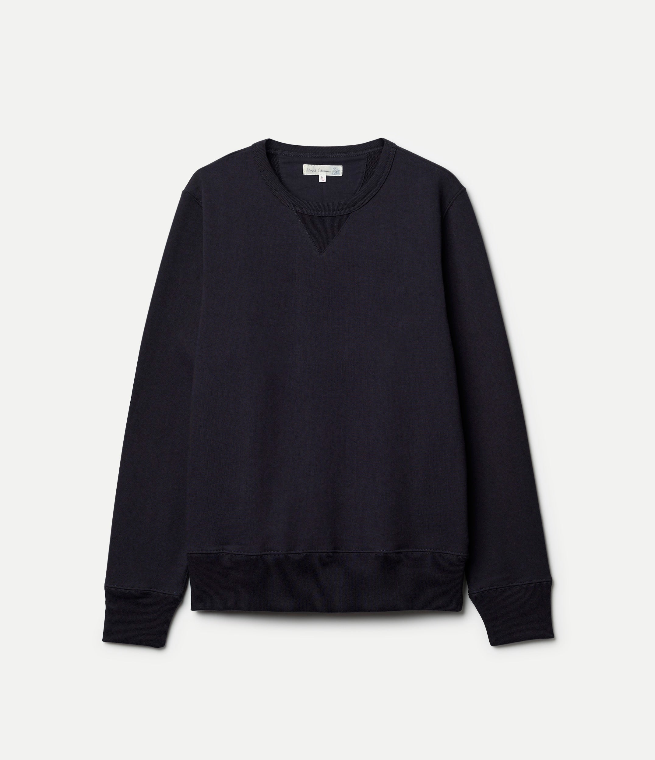 Blue sweatshirt on a light gray background