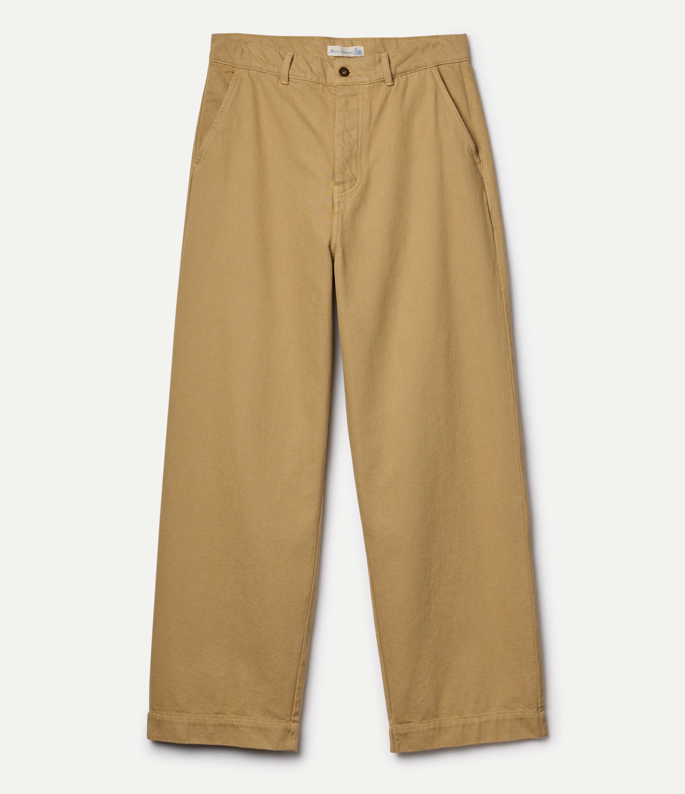 Beige pants against neutral background