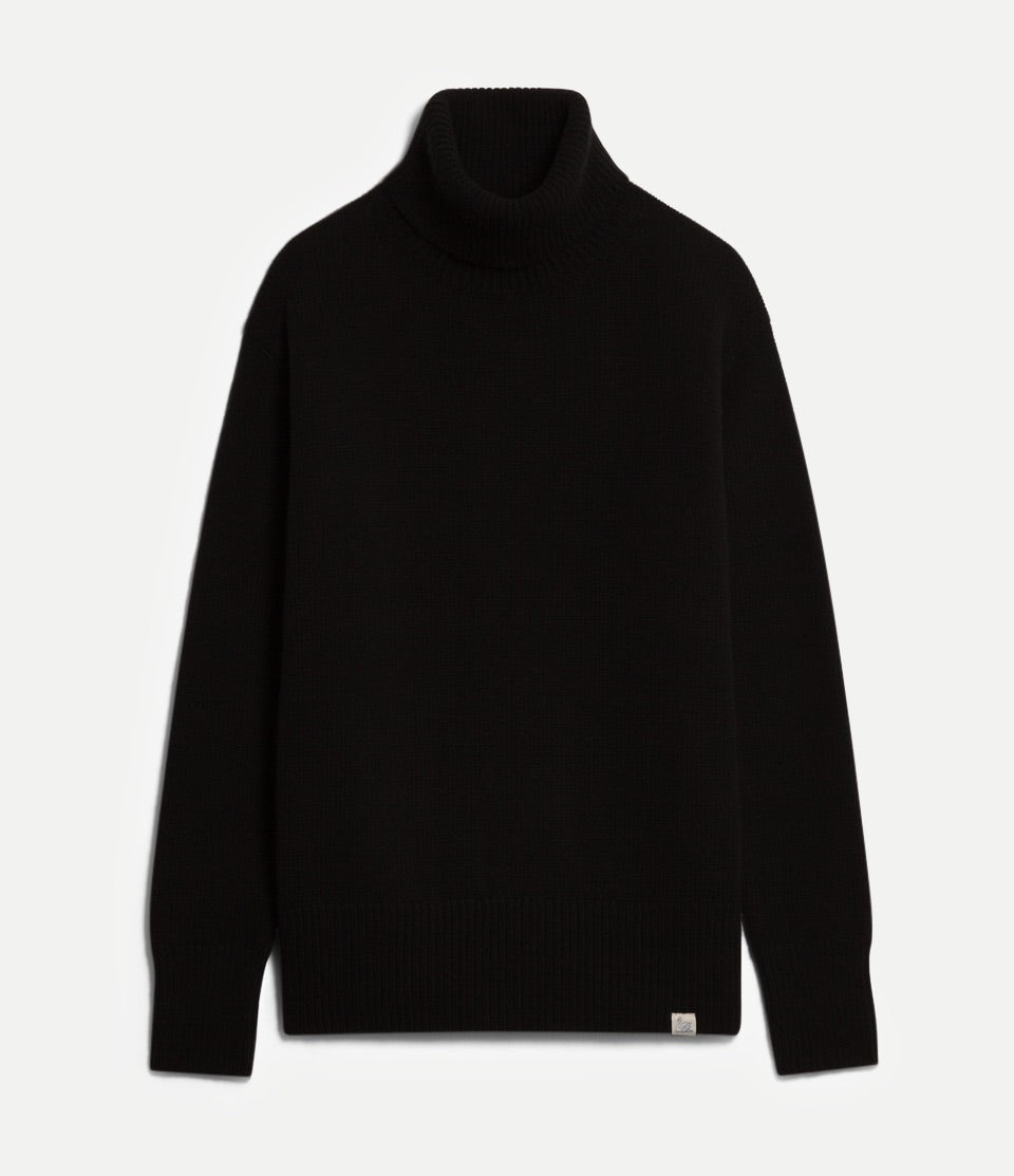 Black turtleneck sweater on a white background