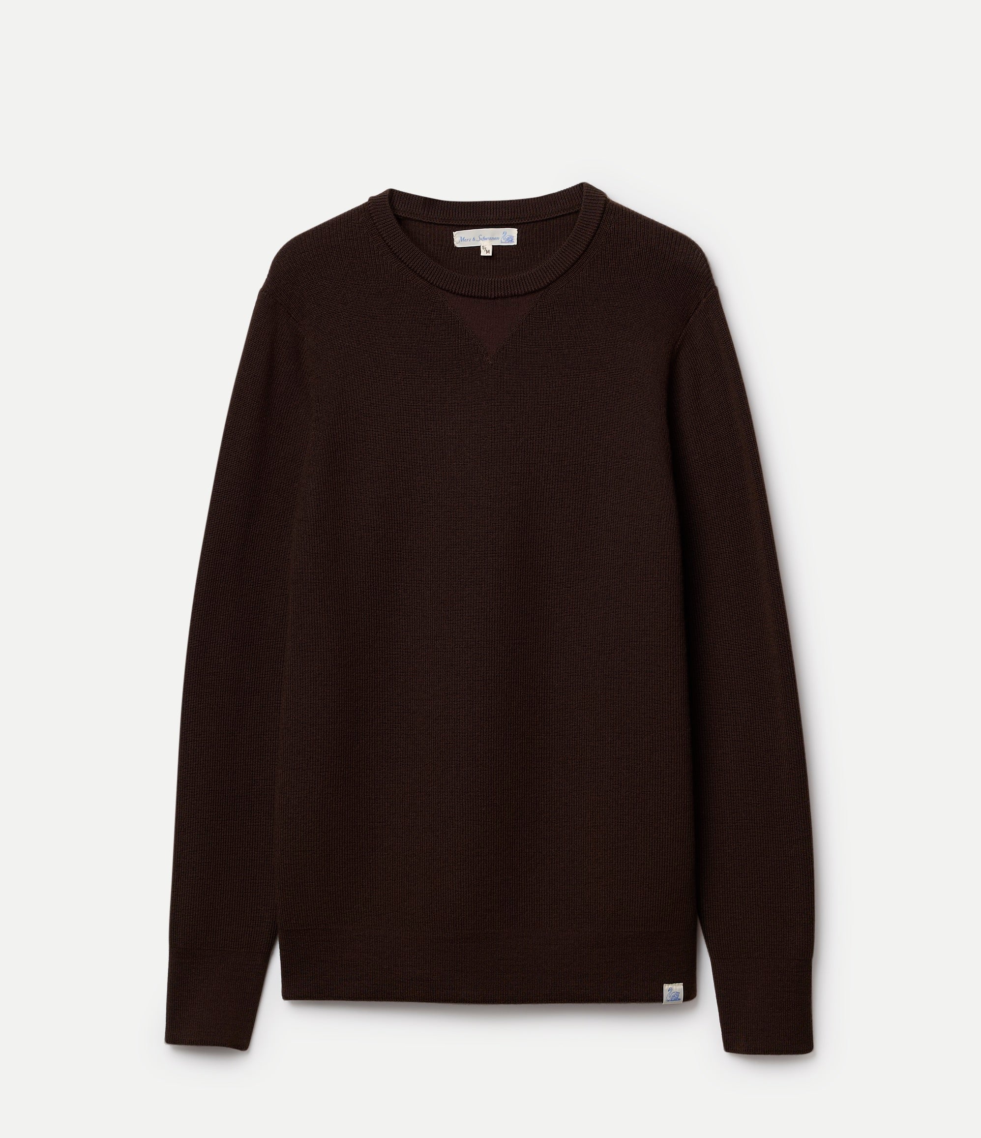 Brown merino wool sweater against neutral background