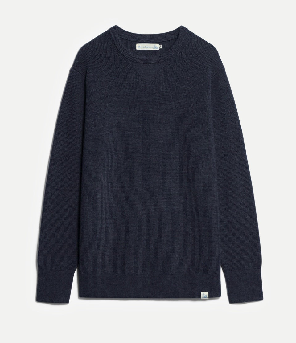 Navy long-sleeve shirt on a light gray background