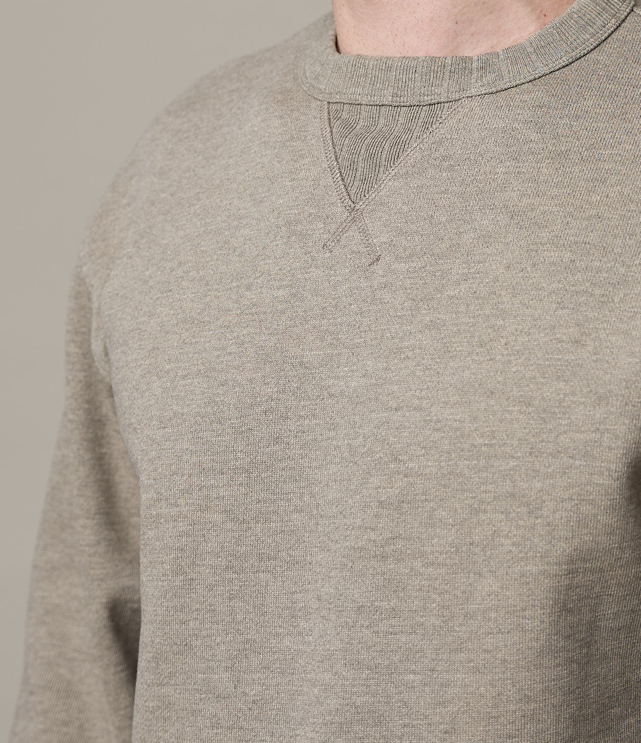 close up shot of rugged fleece sweatshirt in grey