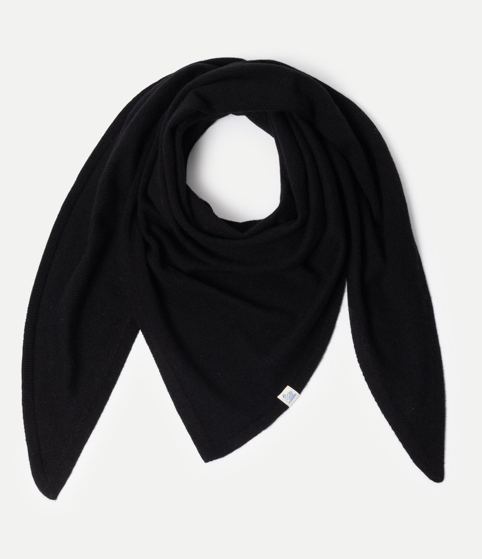 Black Scarf made of merino wool, silk and cashmere against neutral background
