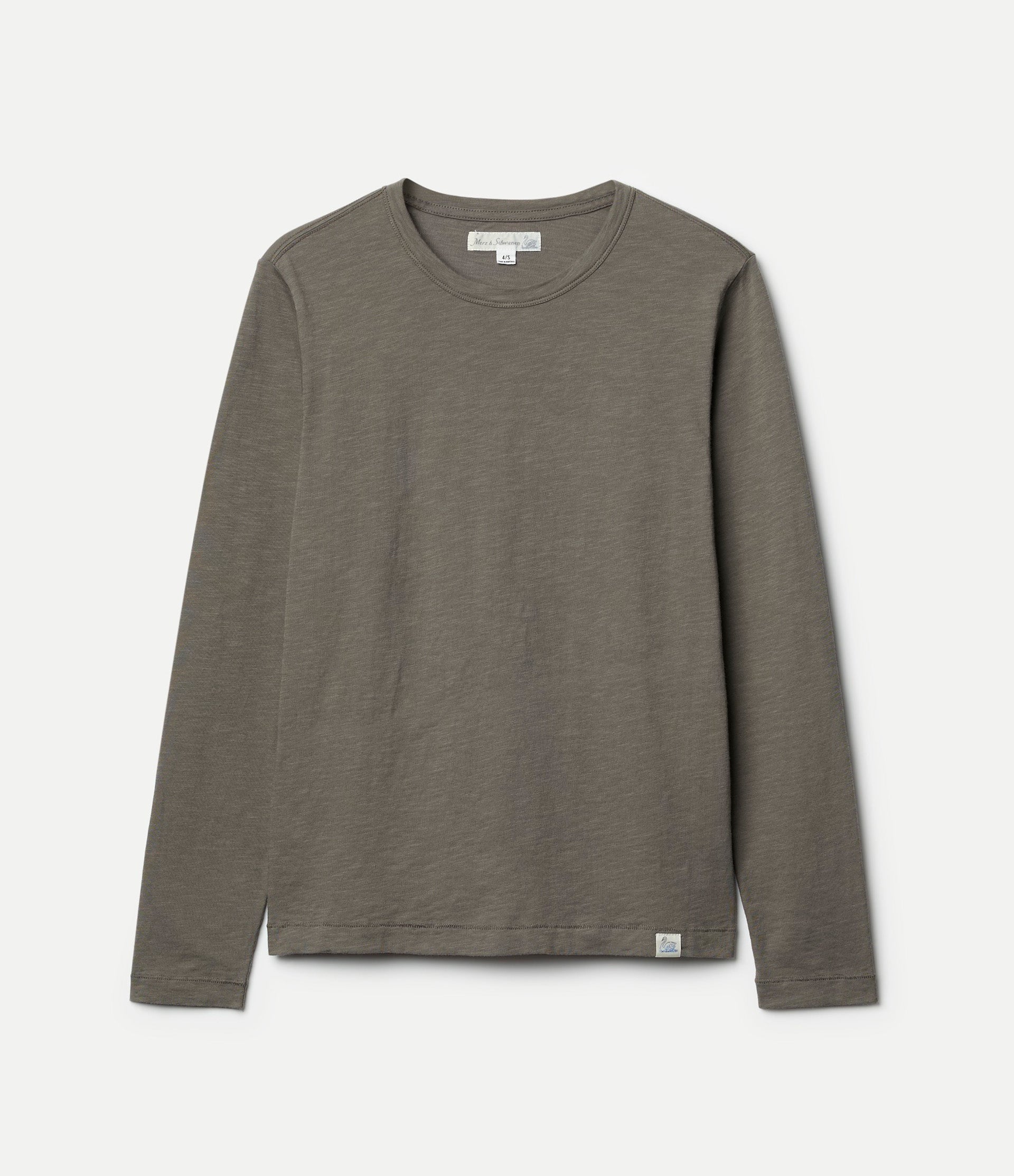 Green long-sleeve shirt on a light gray background