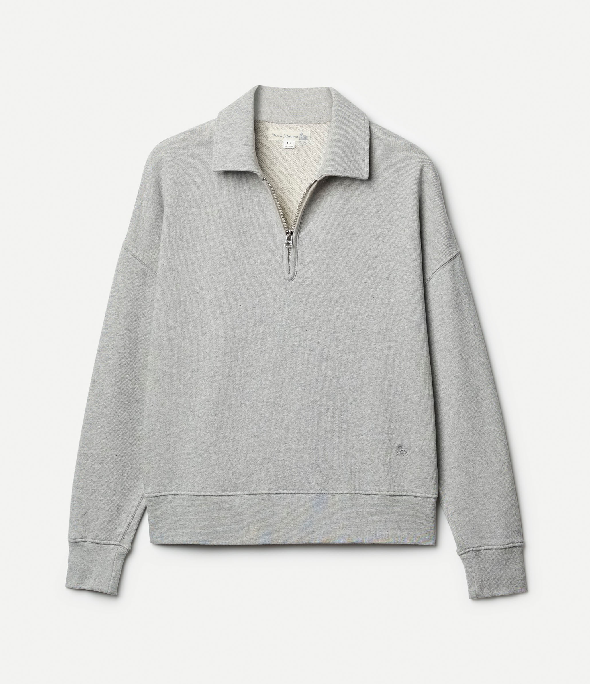 Grey half zip sweatshirt on neutral background