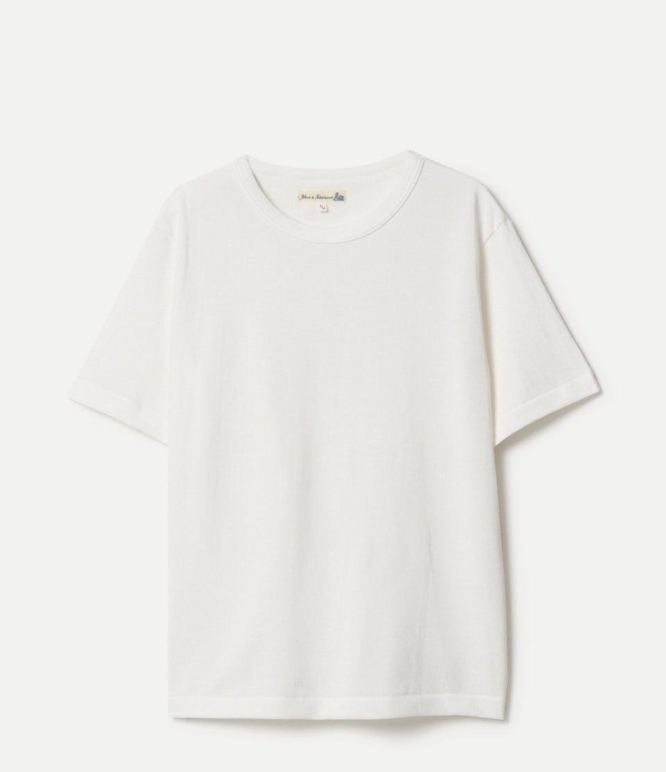 White t-shirt on a light gray background