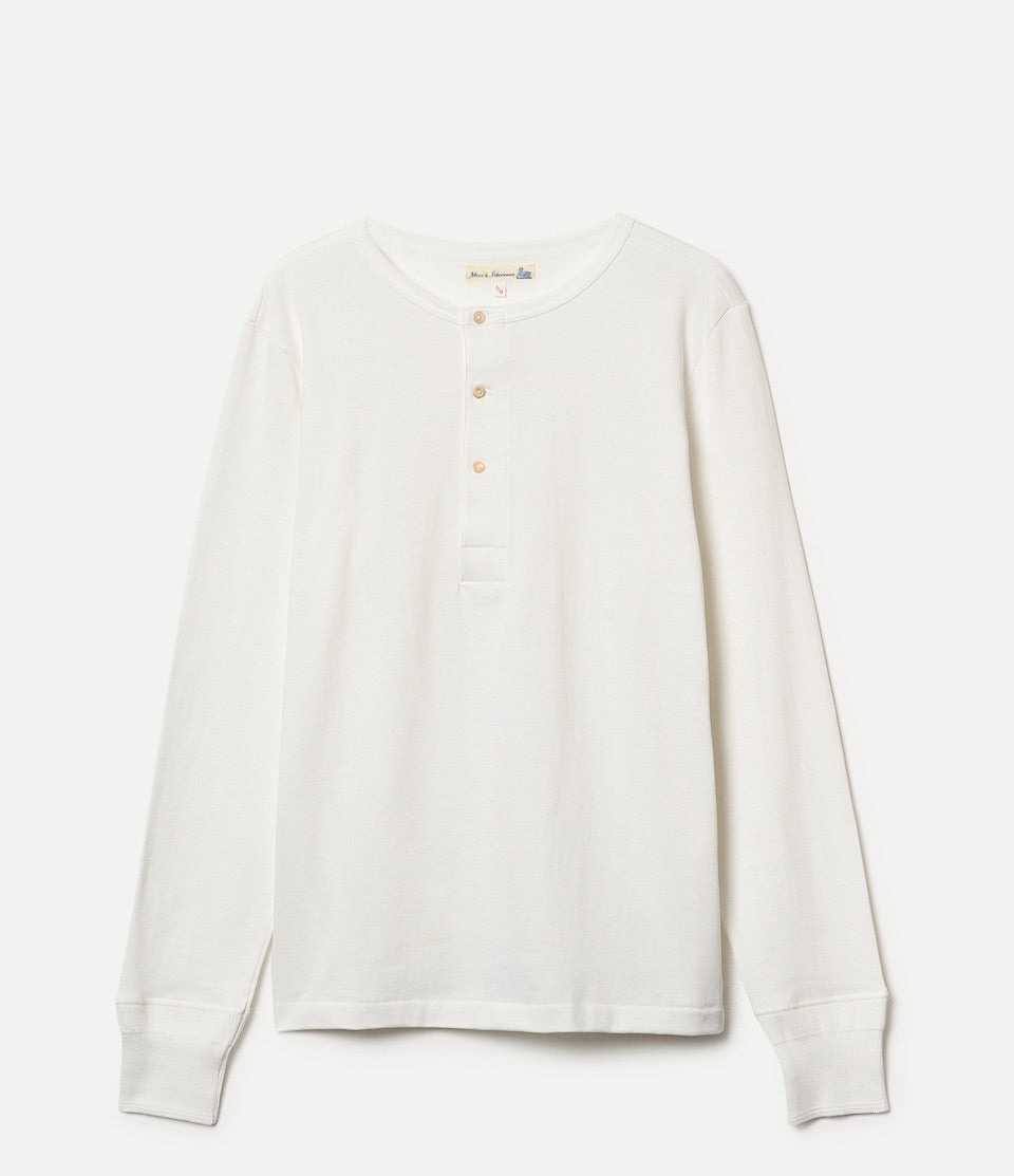 White long-sleeve shirt on a light gray background