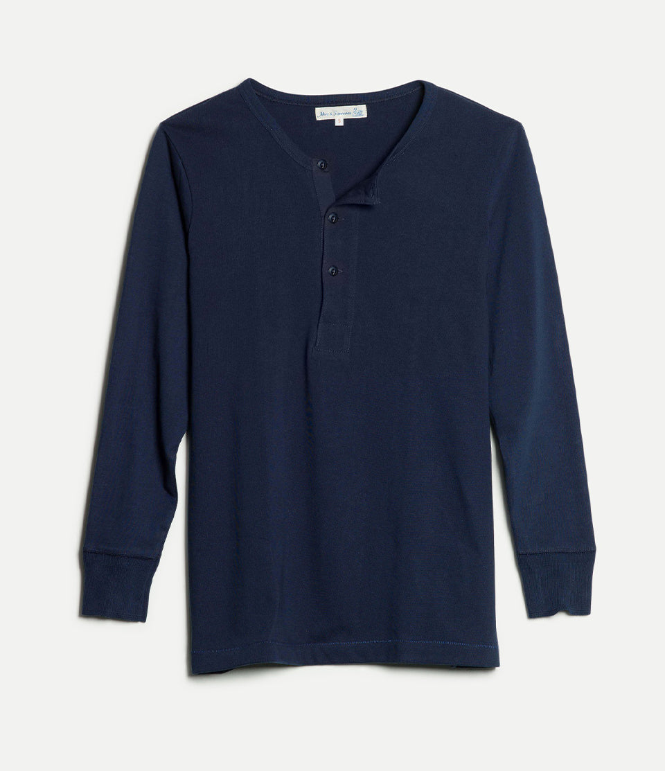 Navy long-sleeve henley shirt on a light gray background