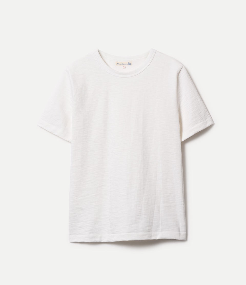 White t-shirt on a light gray background