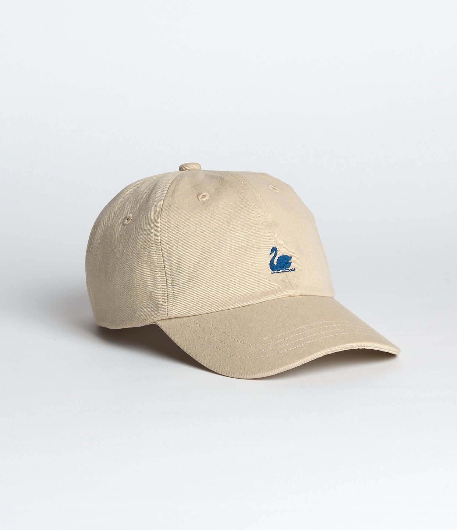 Beige cap with a blue swan logo on a white background