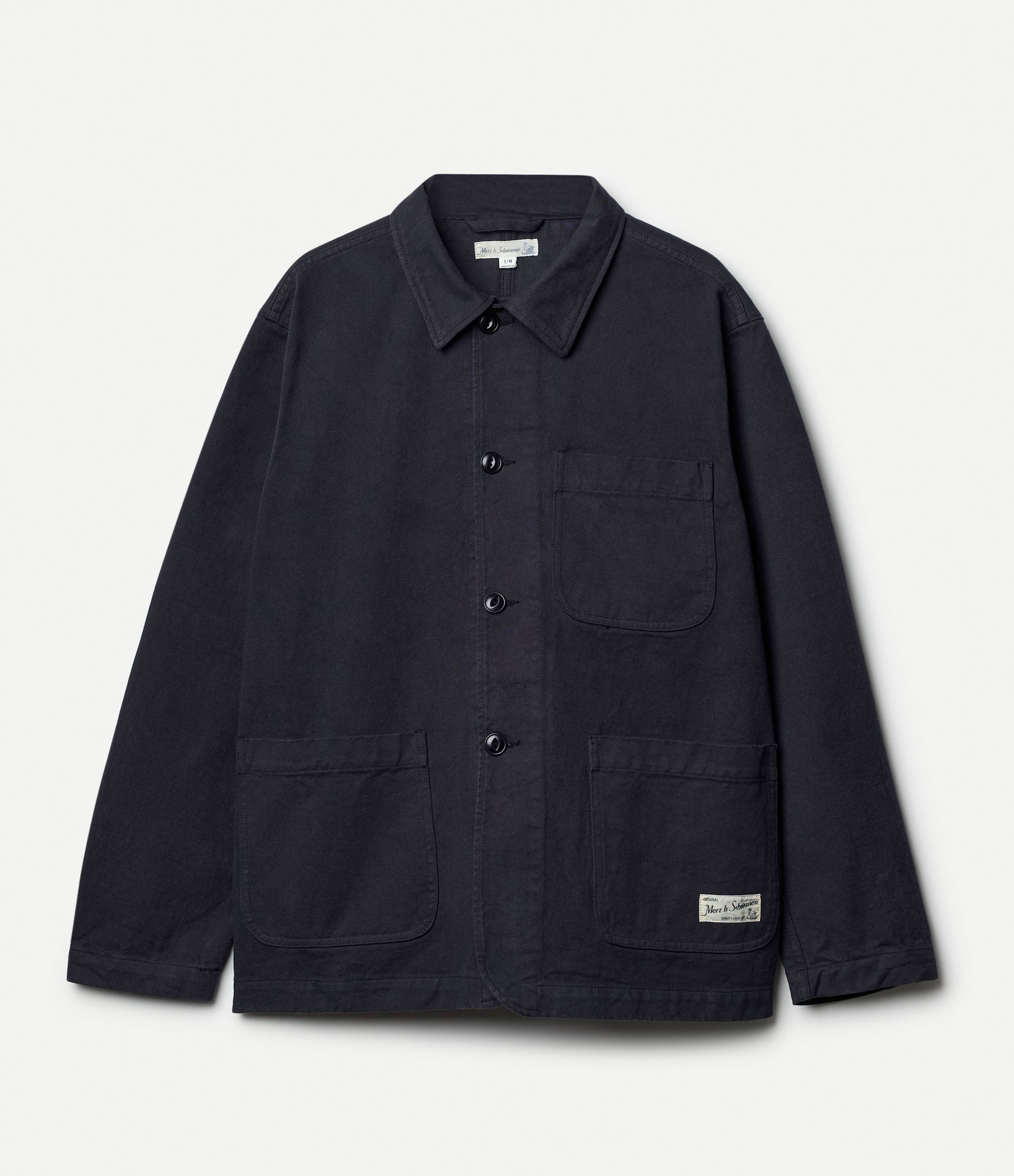 Grey cotton twill jacket agains neutral background