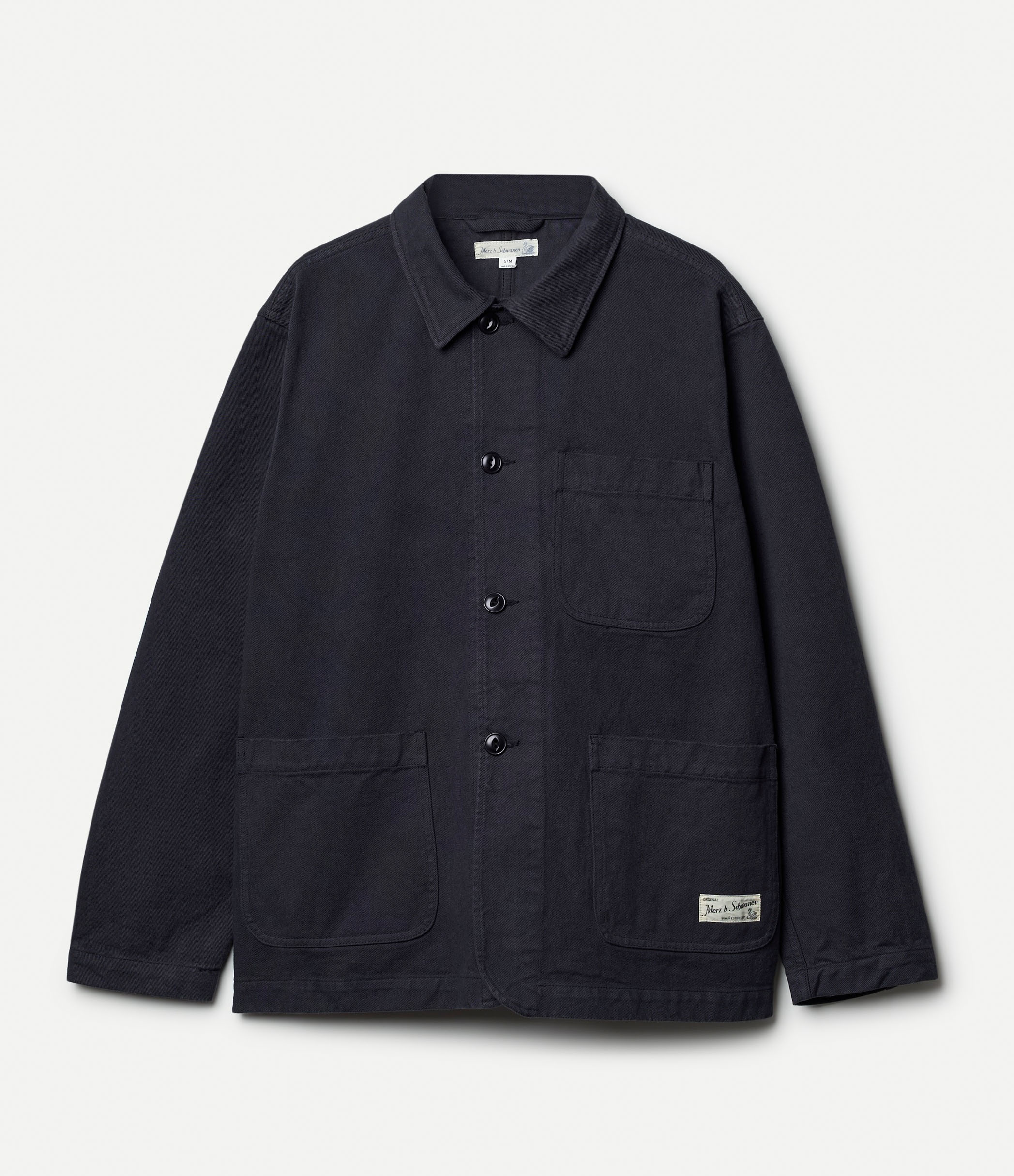 Grey cotton twill jacket agains neutral background