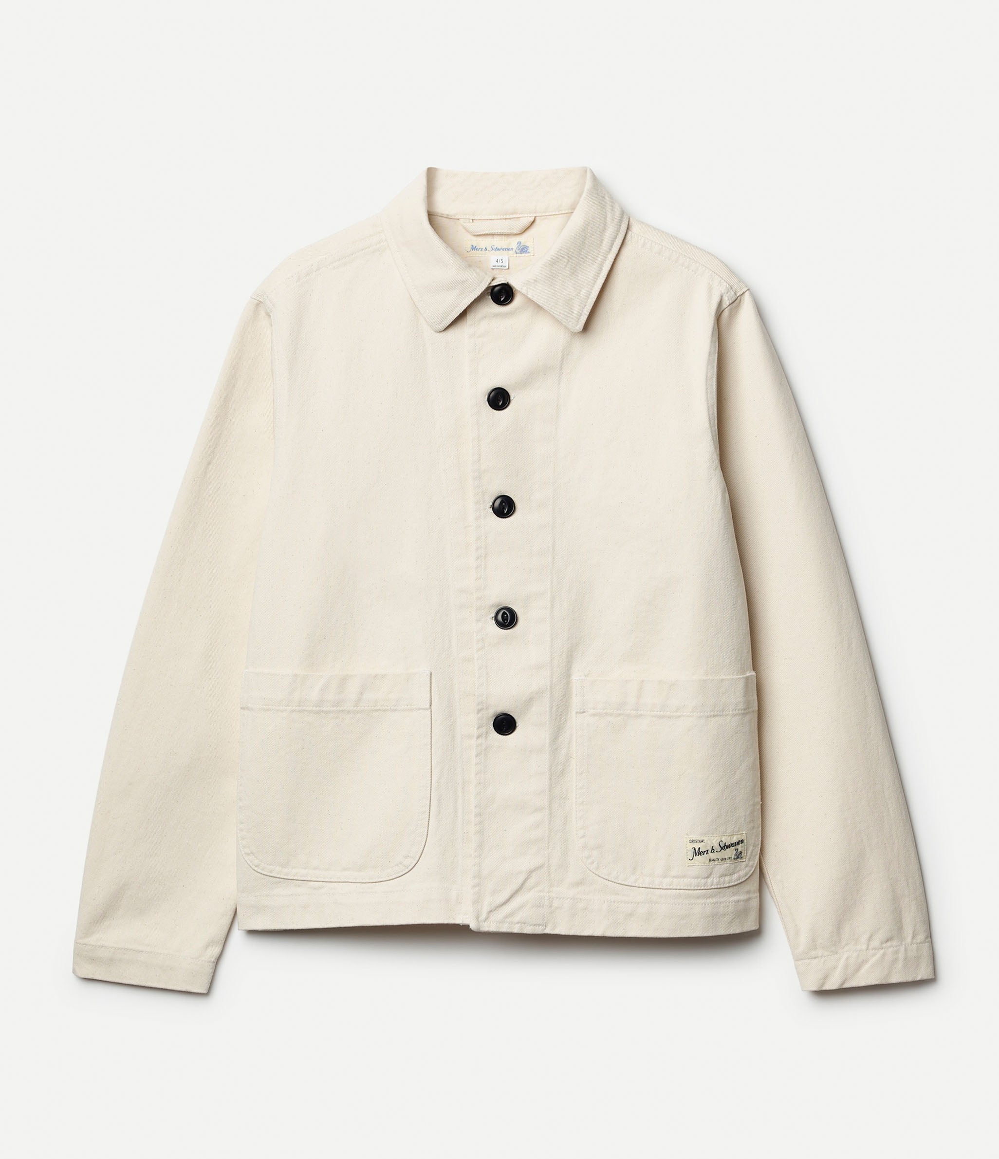 Beige jacket with black buttons on a white background
