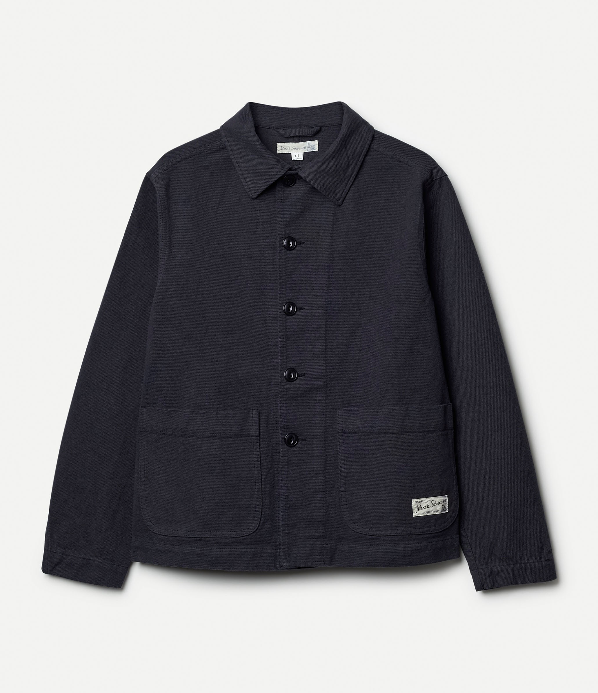 Dark grey cotton twill jacket against neutral background