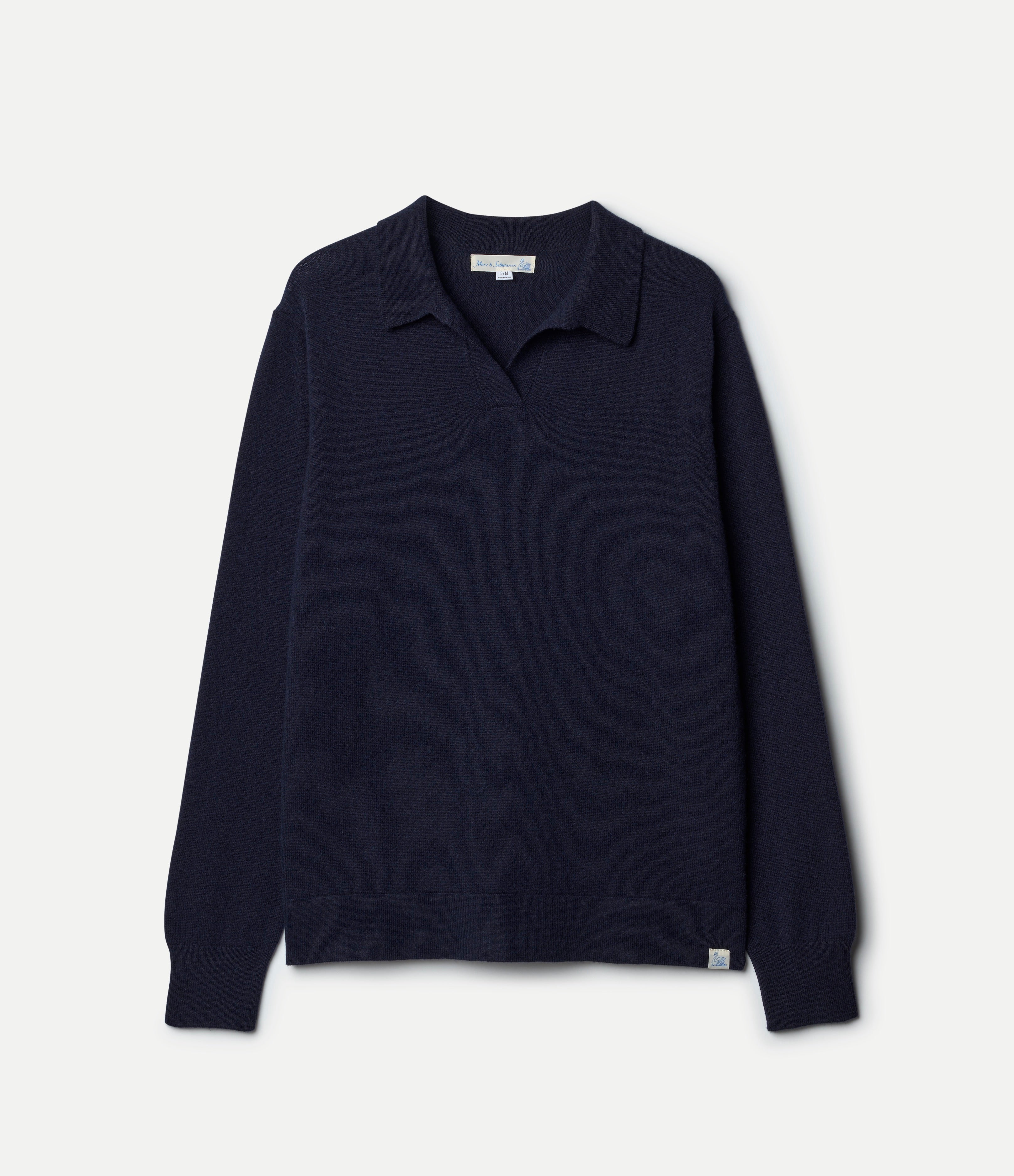 Navy long-sleeve shirt on a light gray background