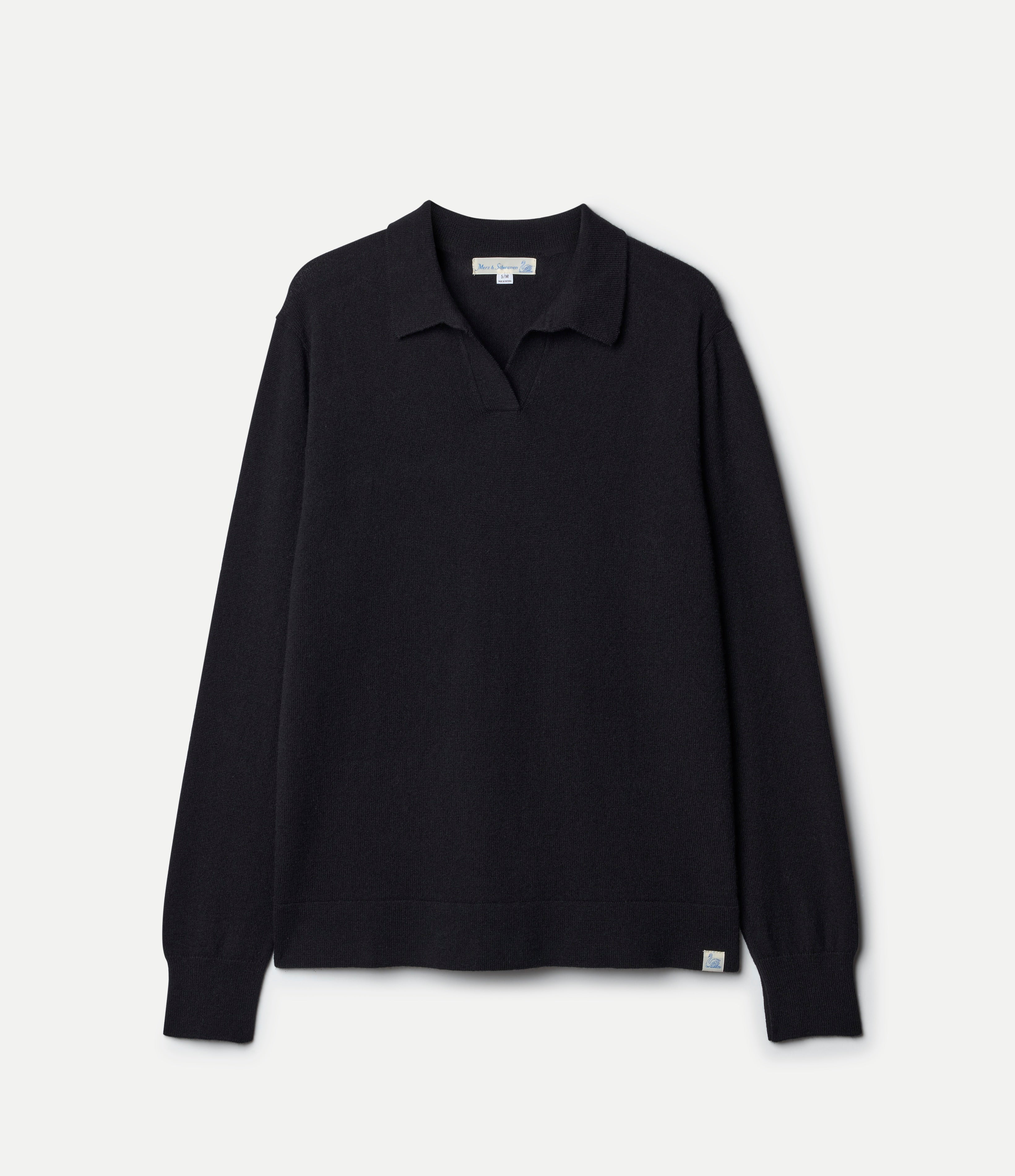 Black long-sleeve shirt on a light gray background