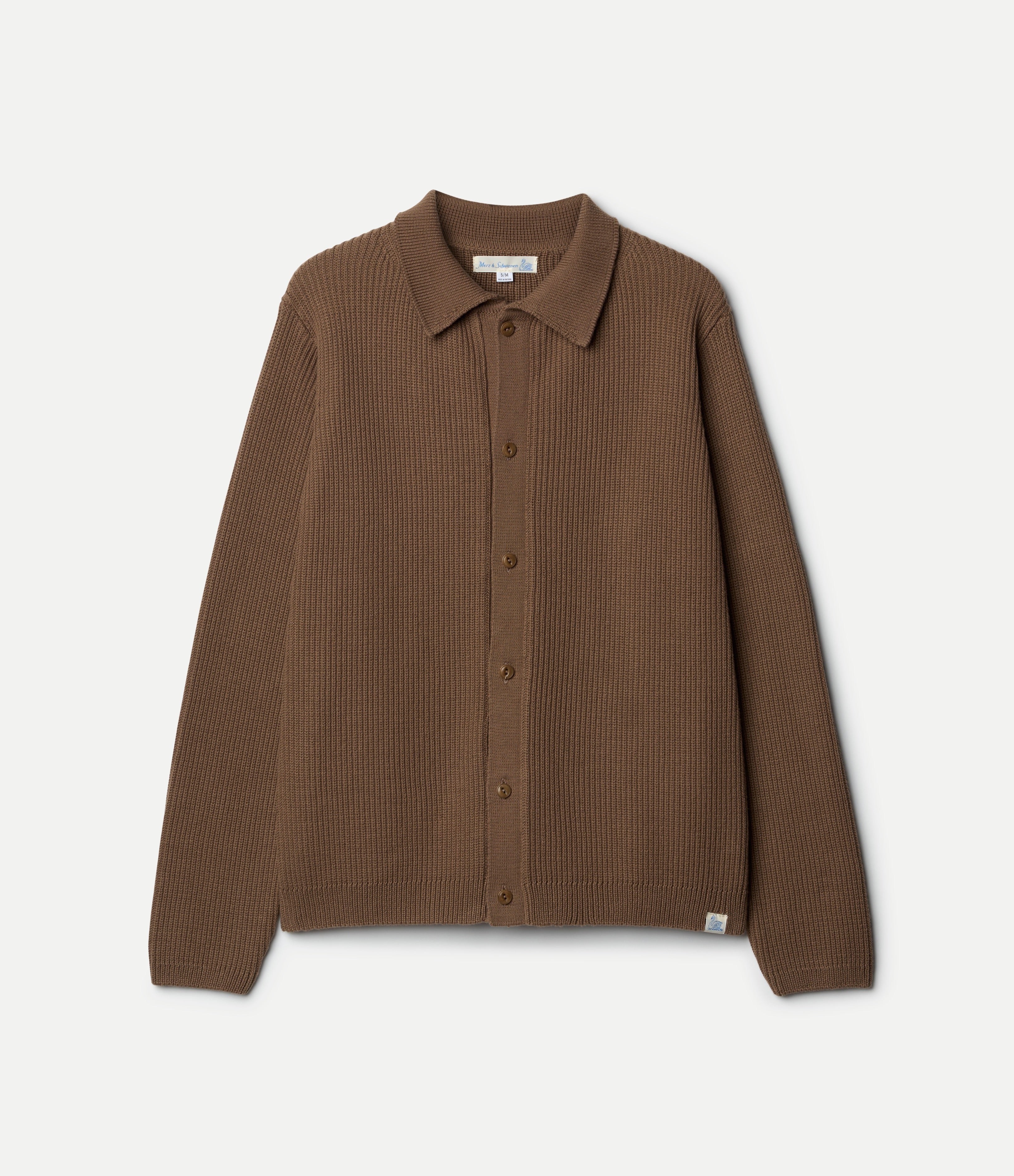 Brown ribbed knitted shirt on a neutral background
