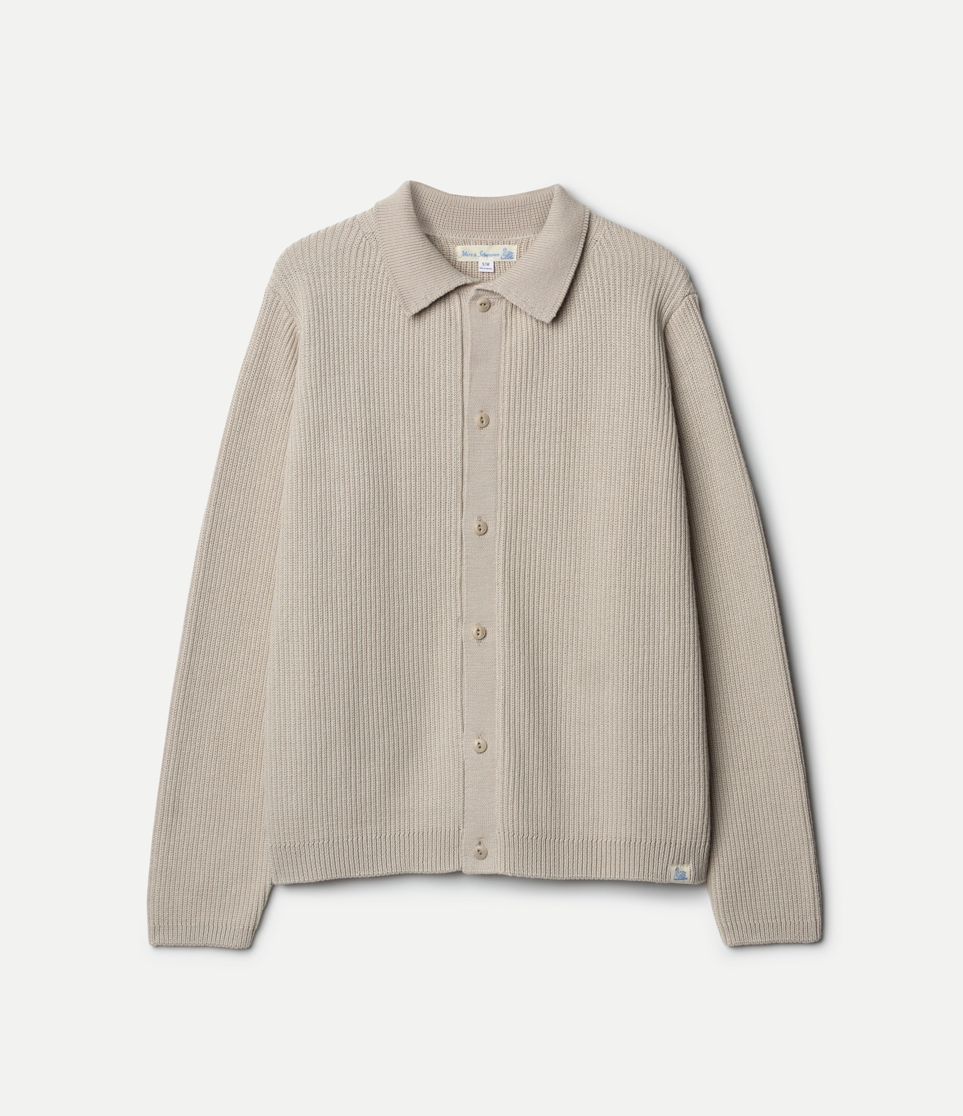 Beige button-up shirt on a light gray background