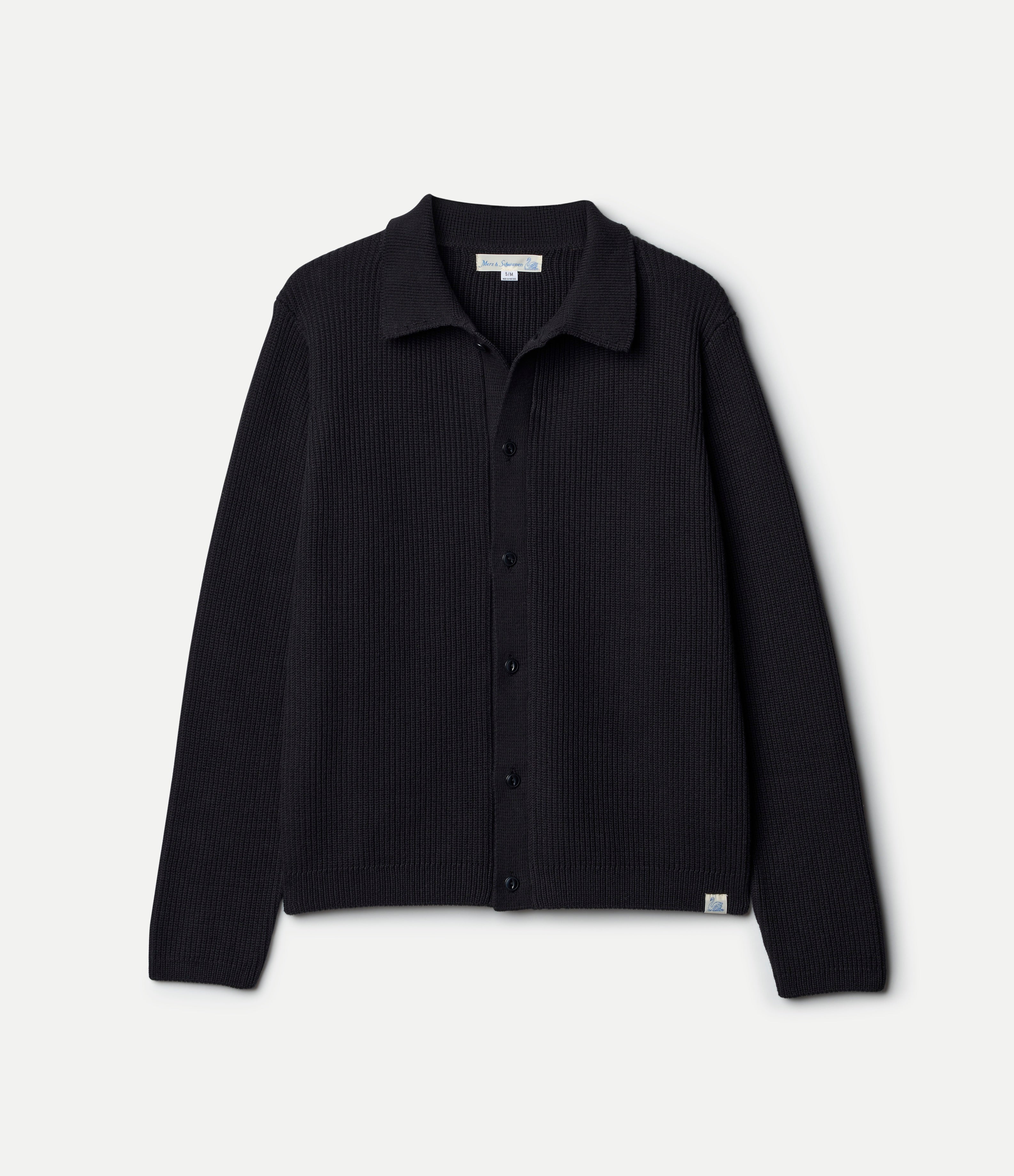 Black ribbed knit button-up shirt on a light gray background