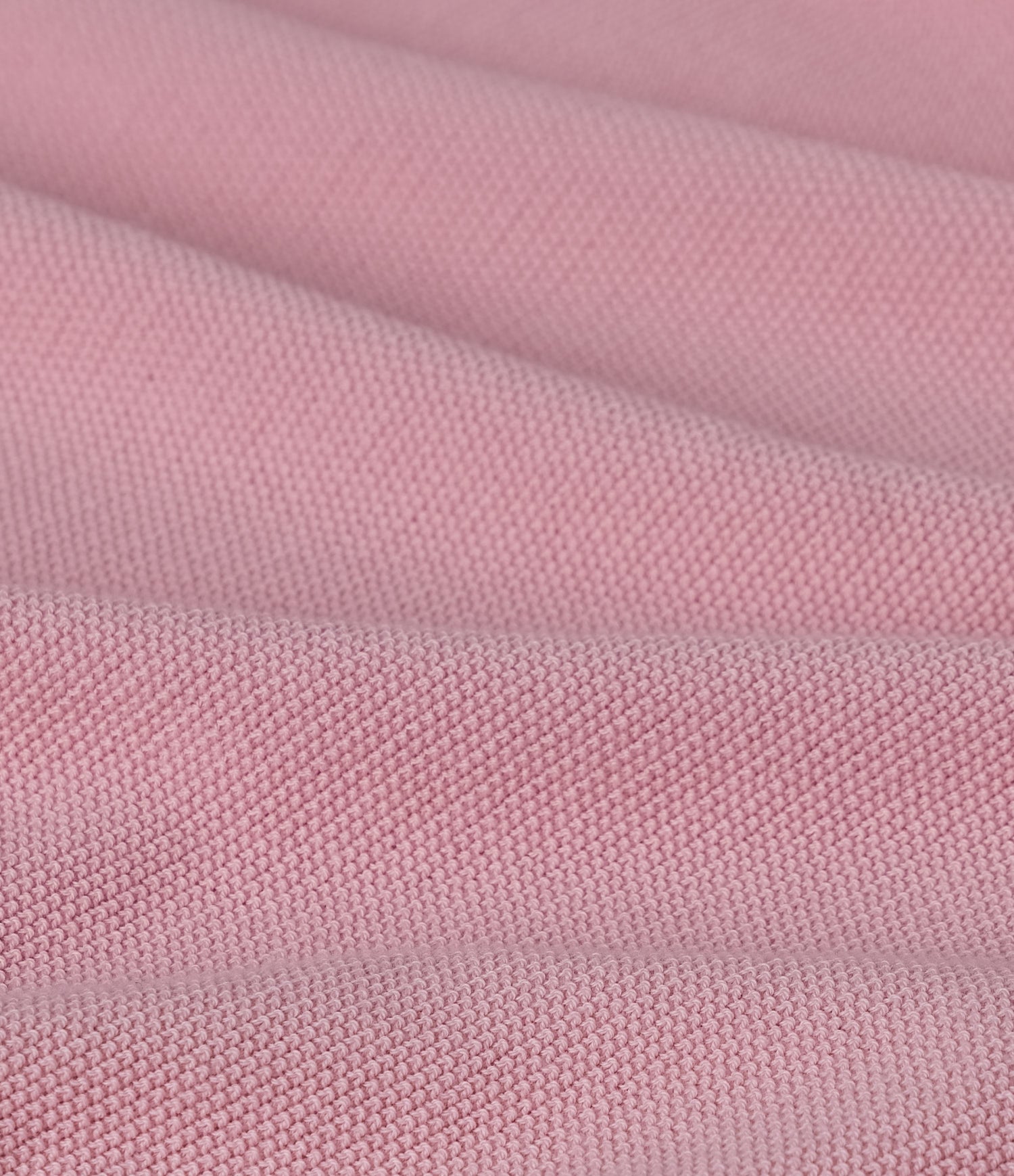 Close-up of pink cotton fabric texture