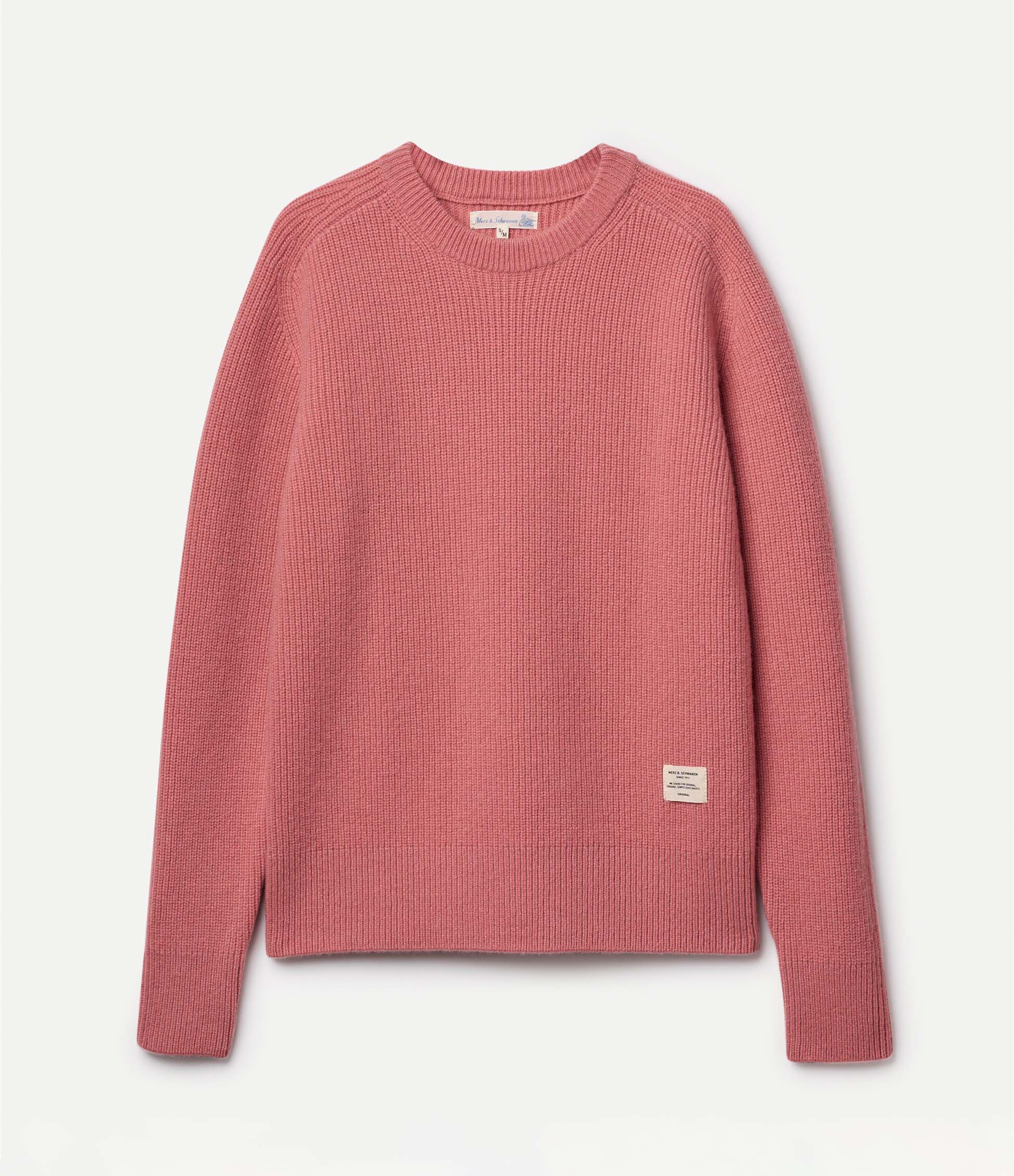 Red ribbed sweater on a light gray background