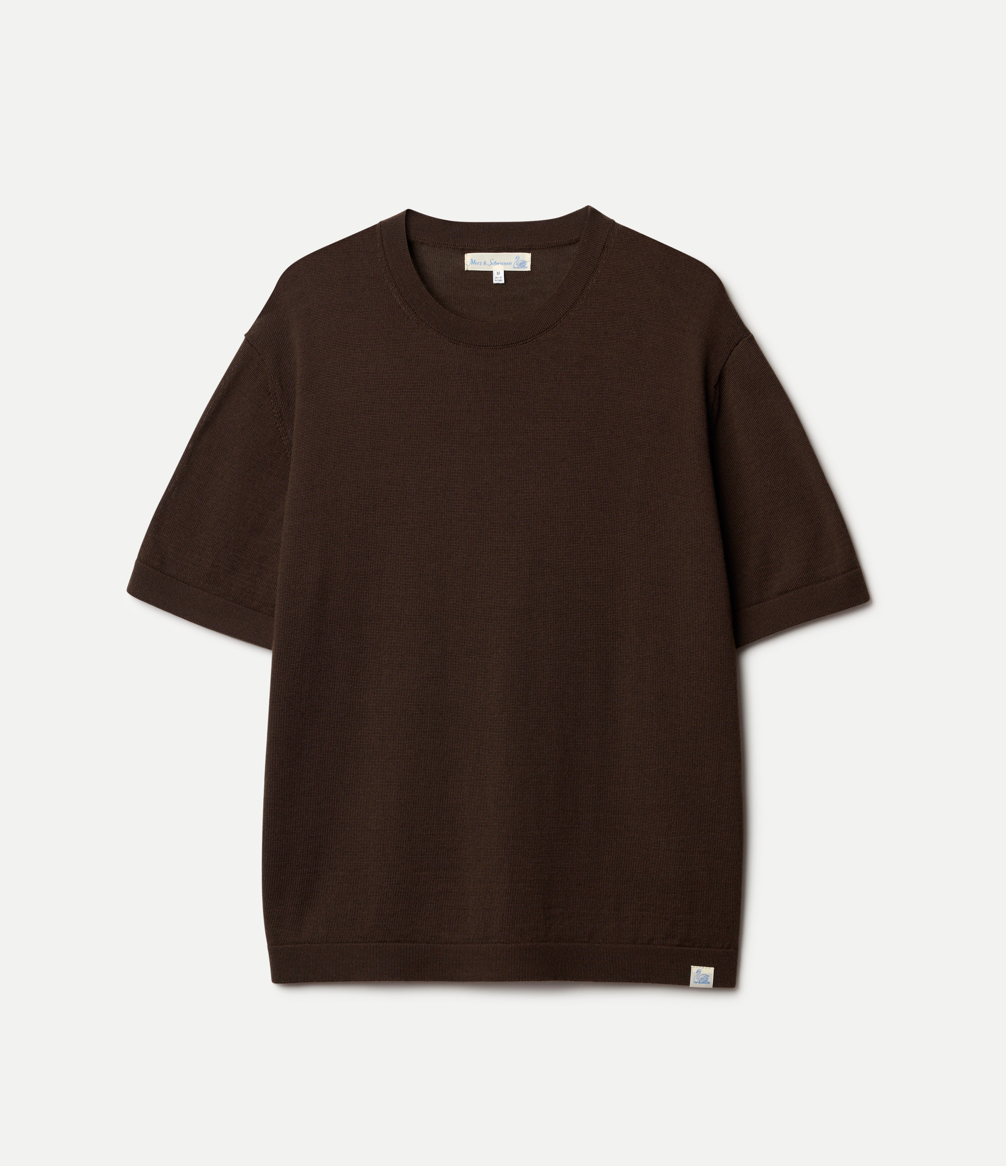 Brown knitted merino wool t-shirt on a light gray background