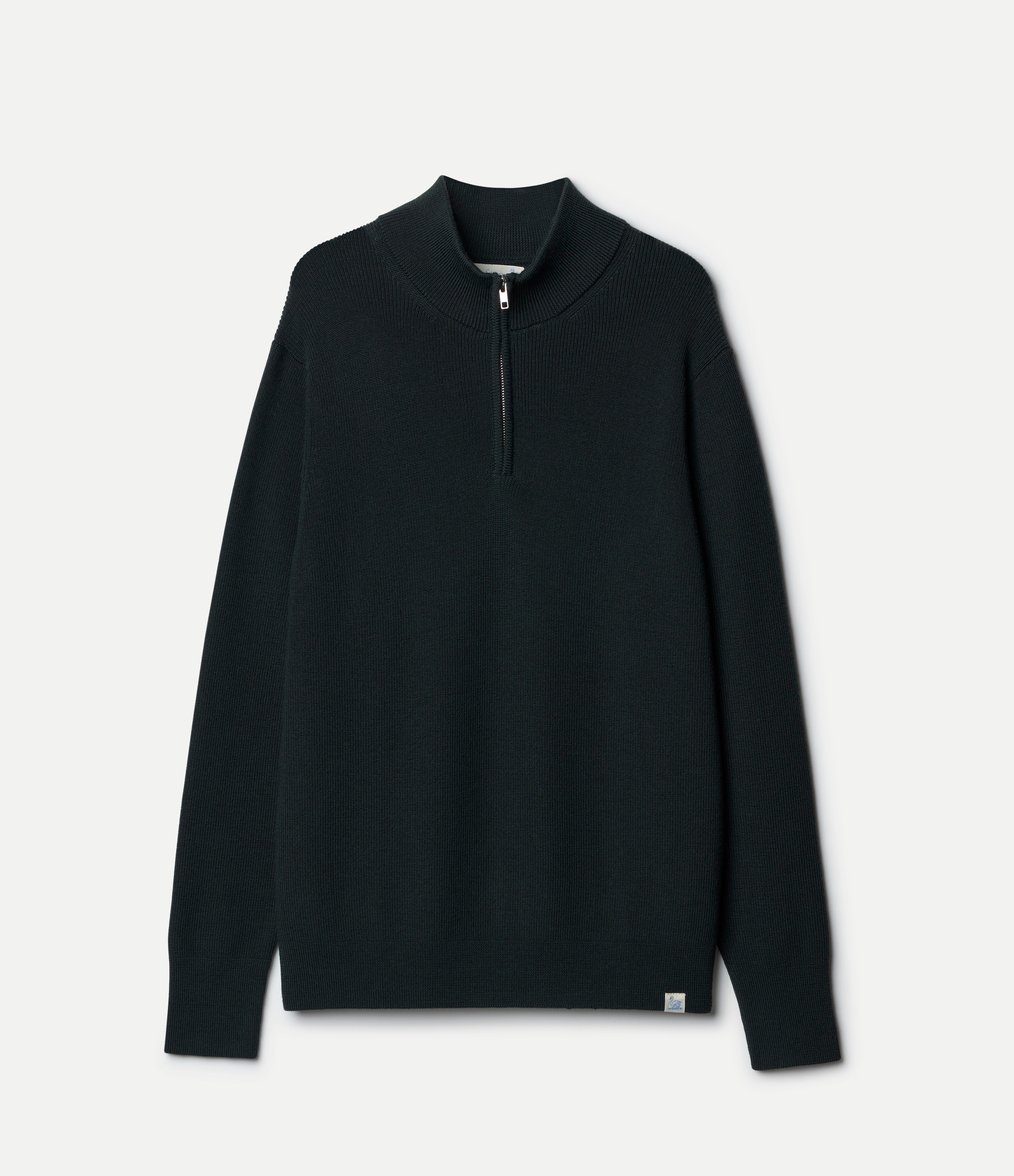 Green long-sleeve sweater with a quarter-zip on a light gray background