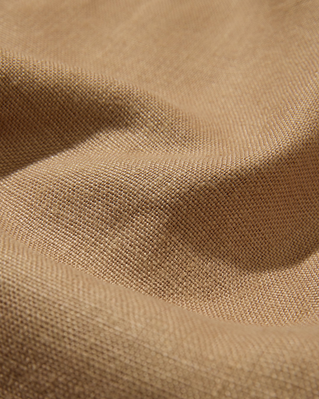 Close-up of brown linen fabric texture