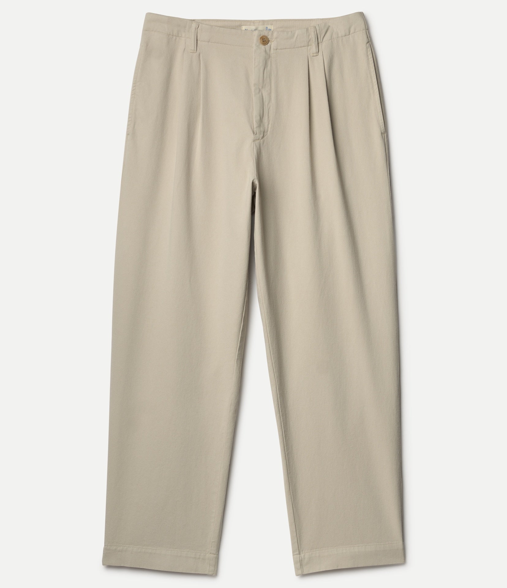 Beige pleated pants on a white background
