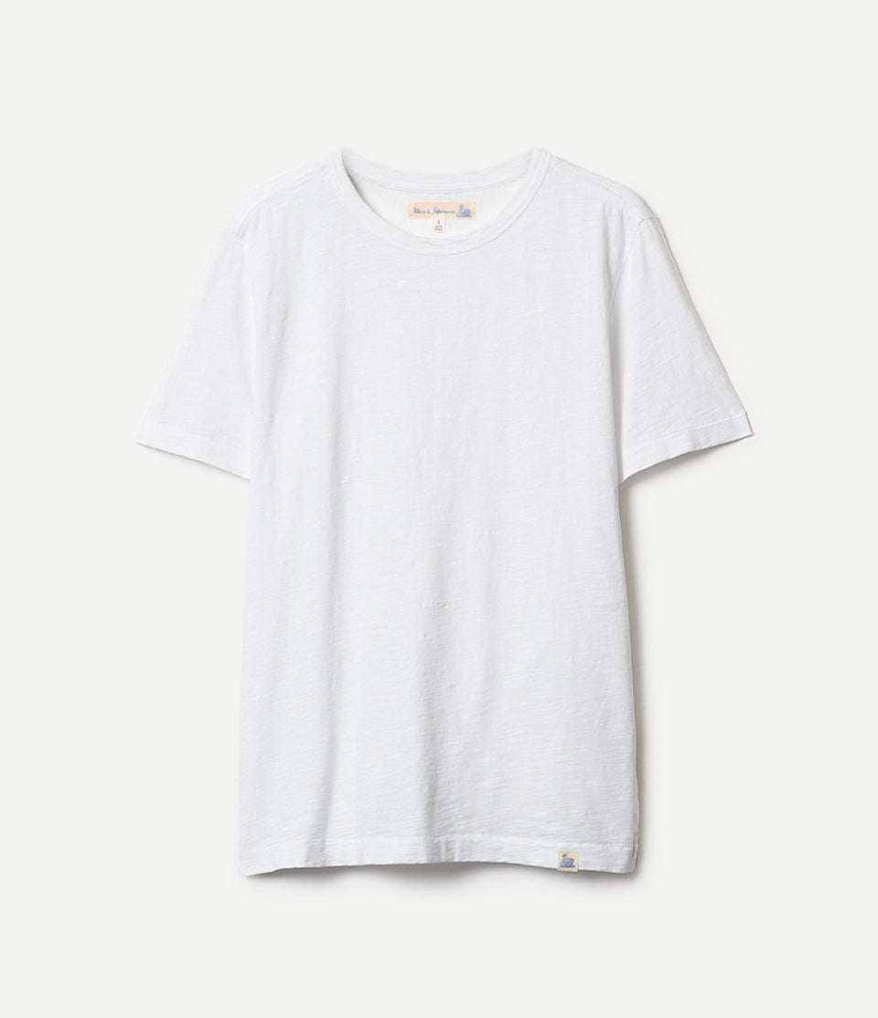 White short-sleeved crew neck t-shirt against white background