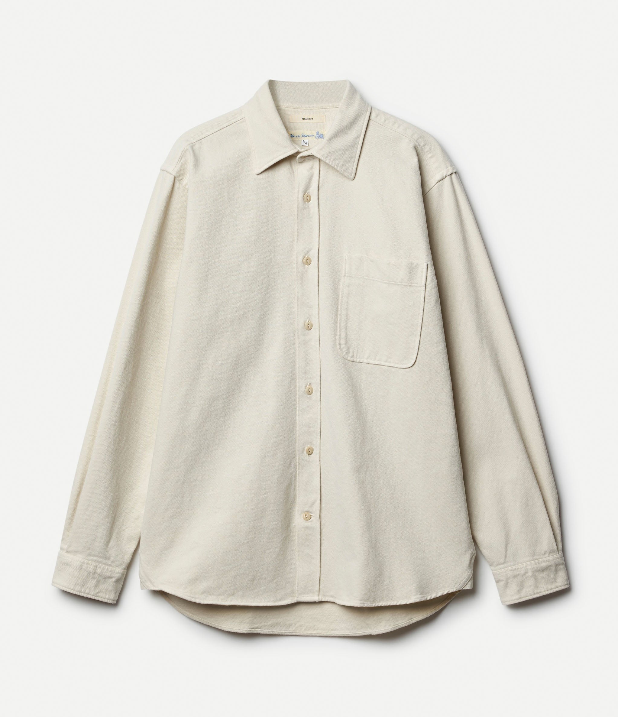 Beige twill shirt against neutral background