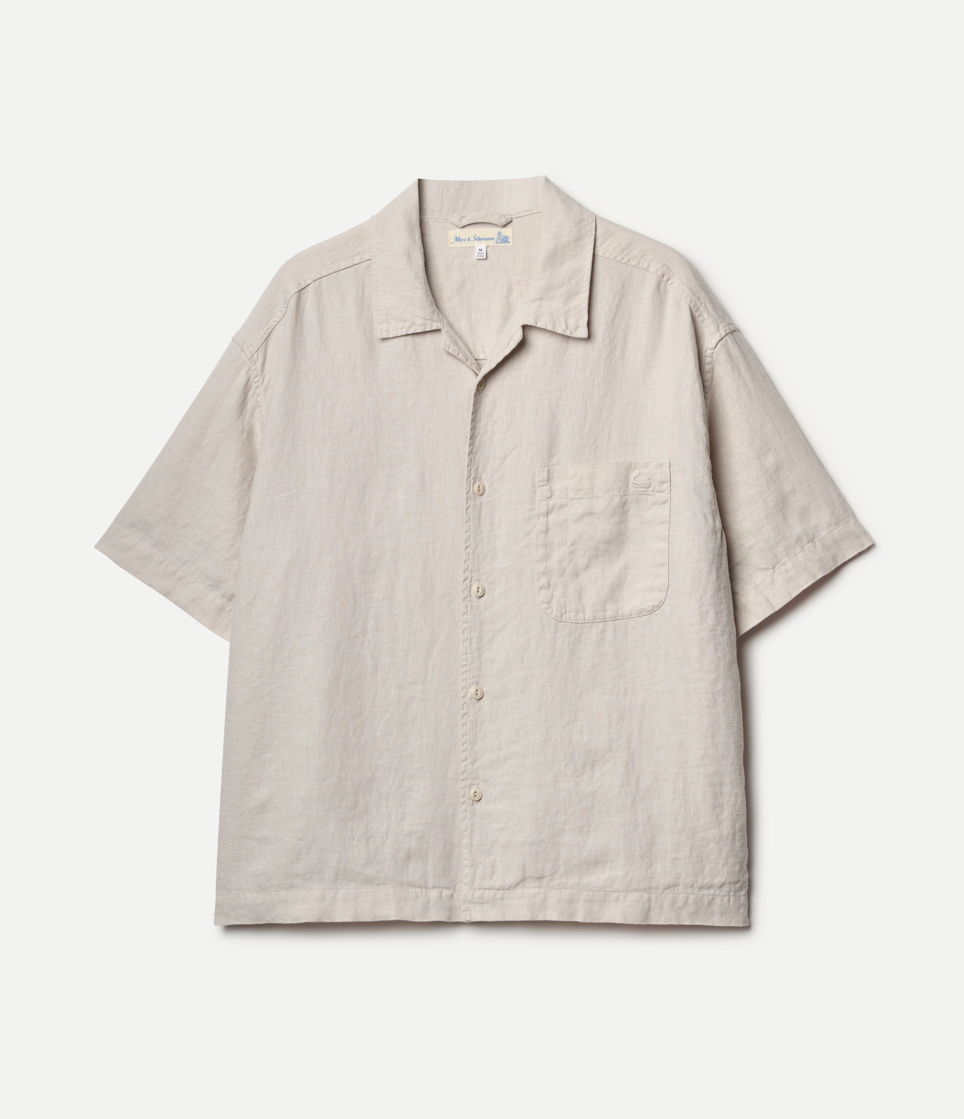 Beige short-sleeve linen shirt on a white background