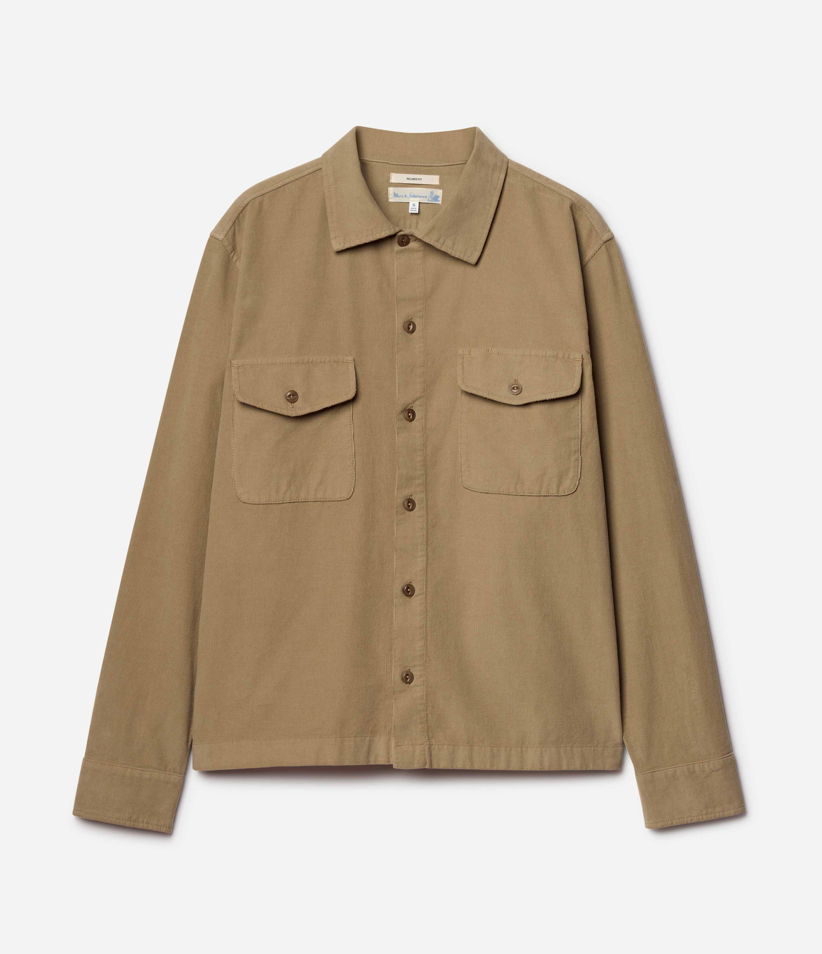 Beige corduroy shirt against a white background