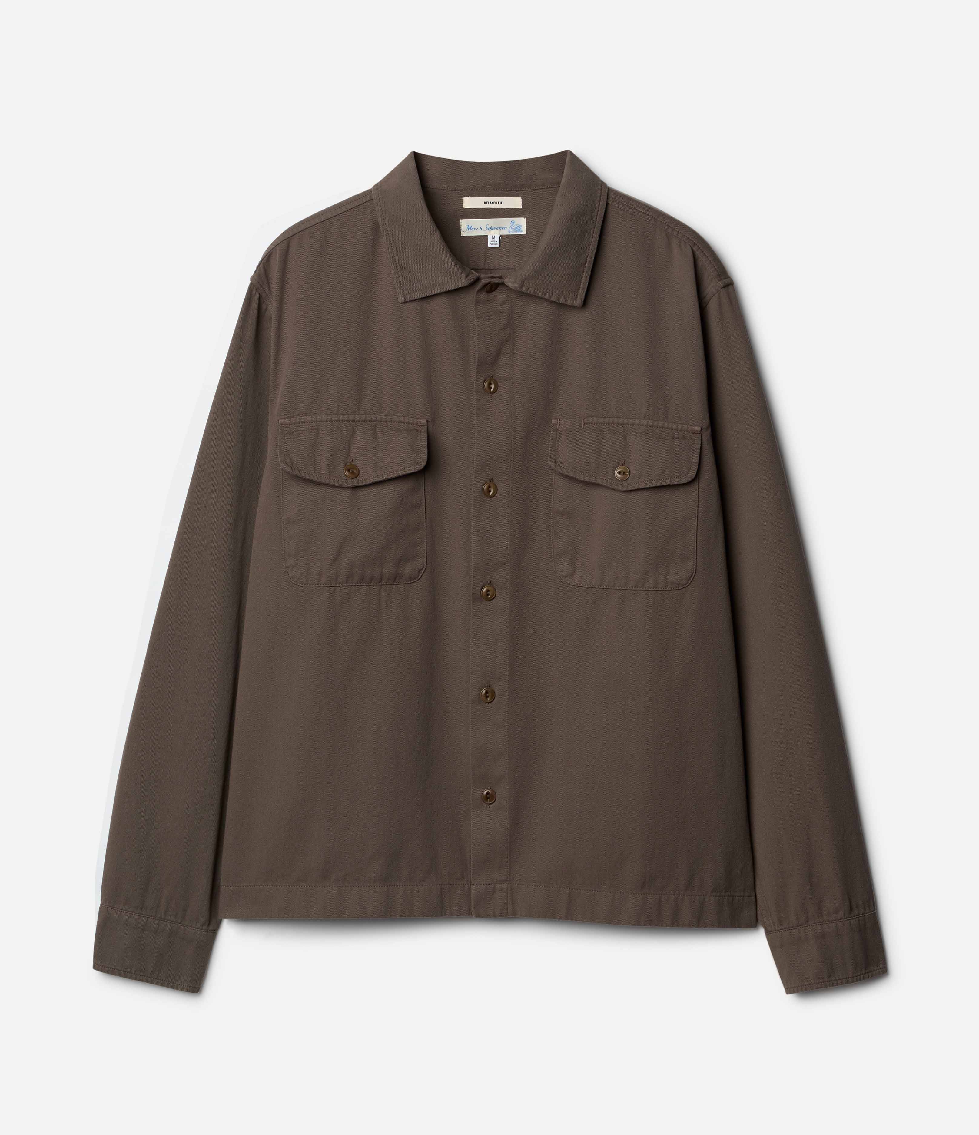Brown jacket with two front pockets on a white background