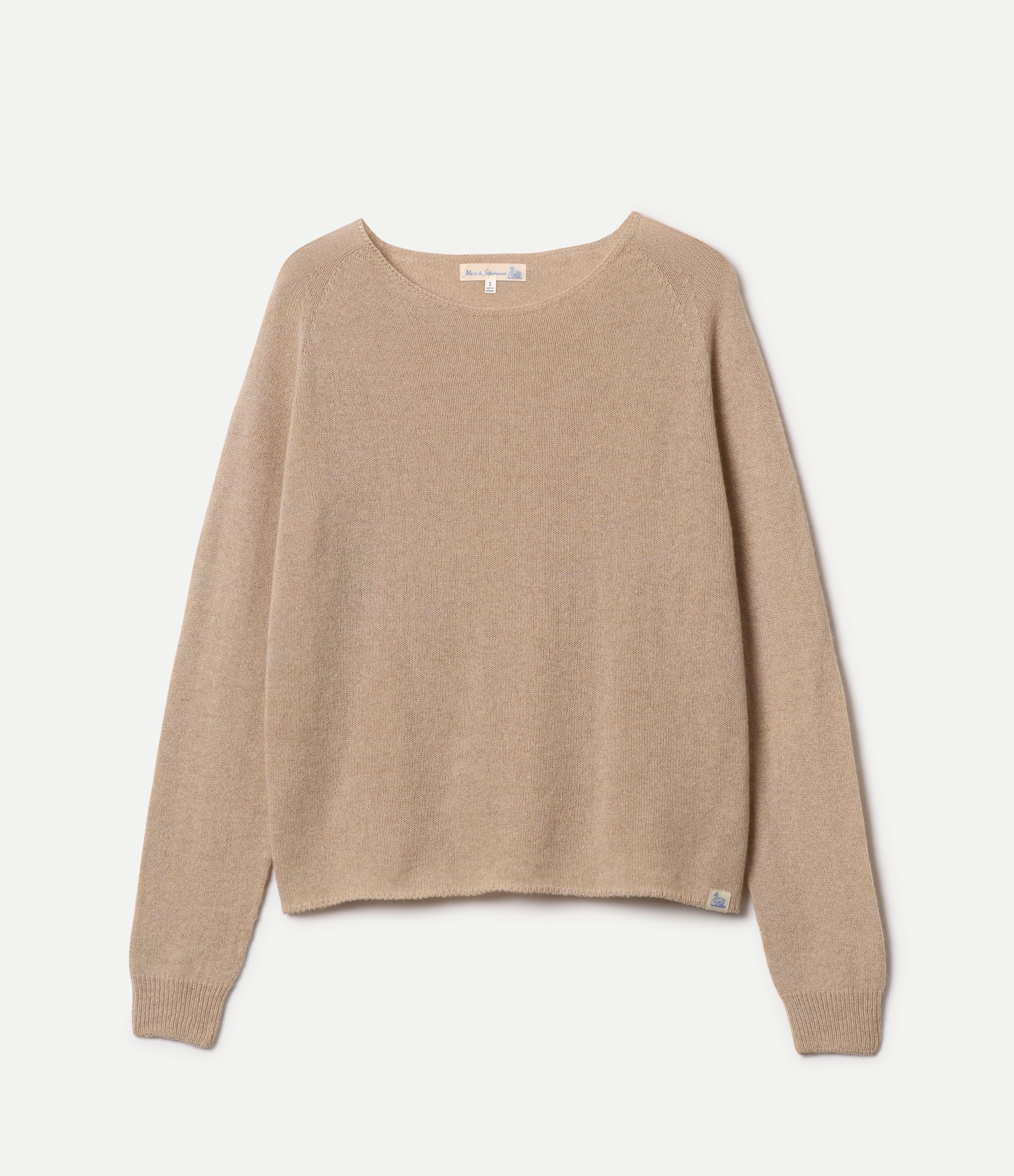 Beige sweater on a white background