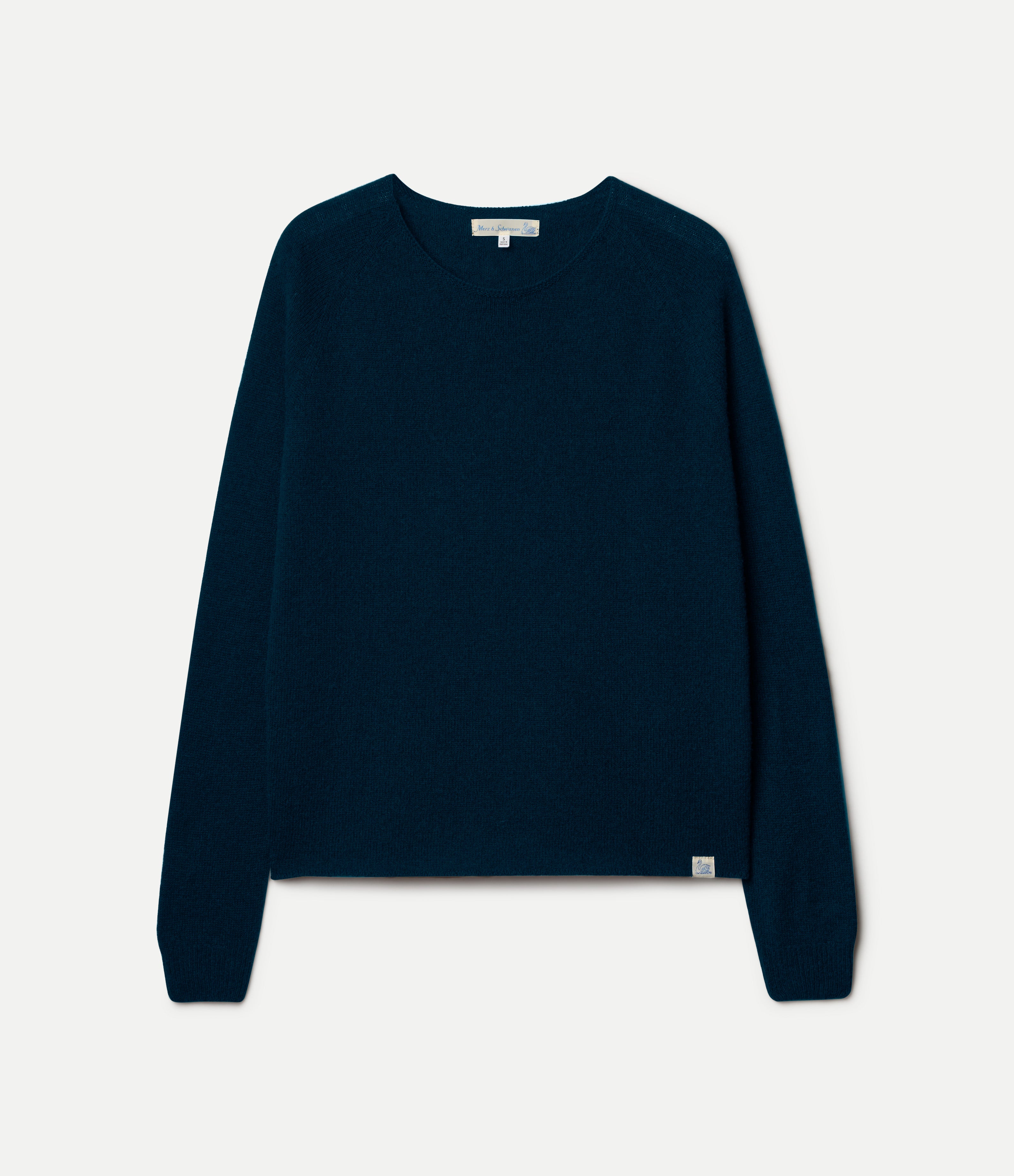 Dark navy sweater on a light gray background