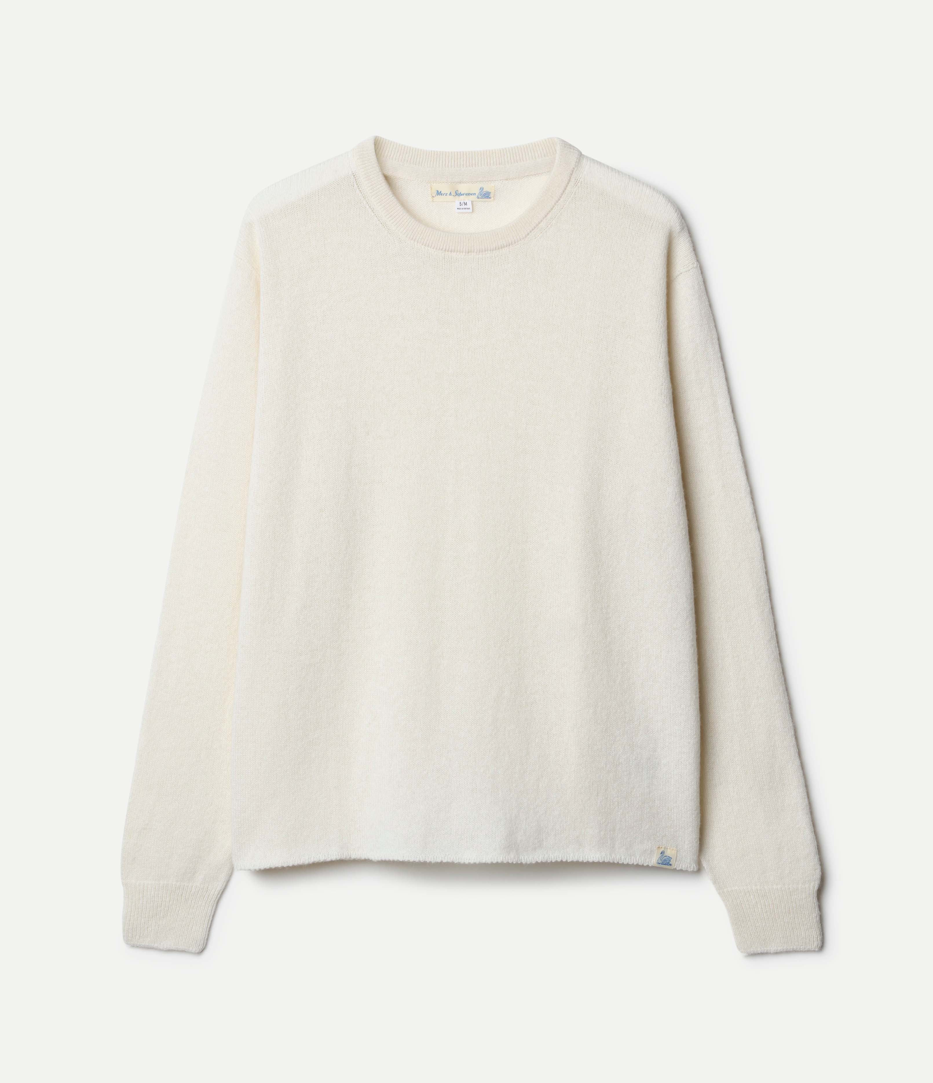 A beige, long-sleeved, extra-fine merino wool-cashmere-silk sweater against a white background.
