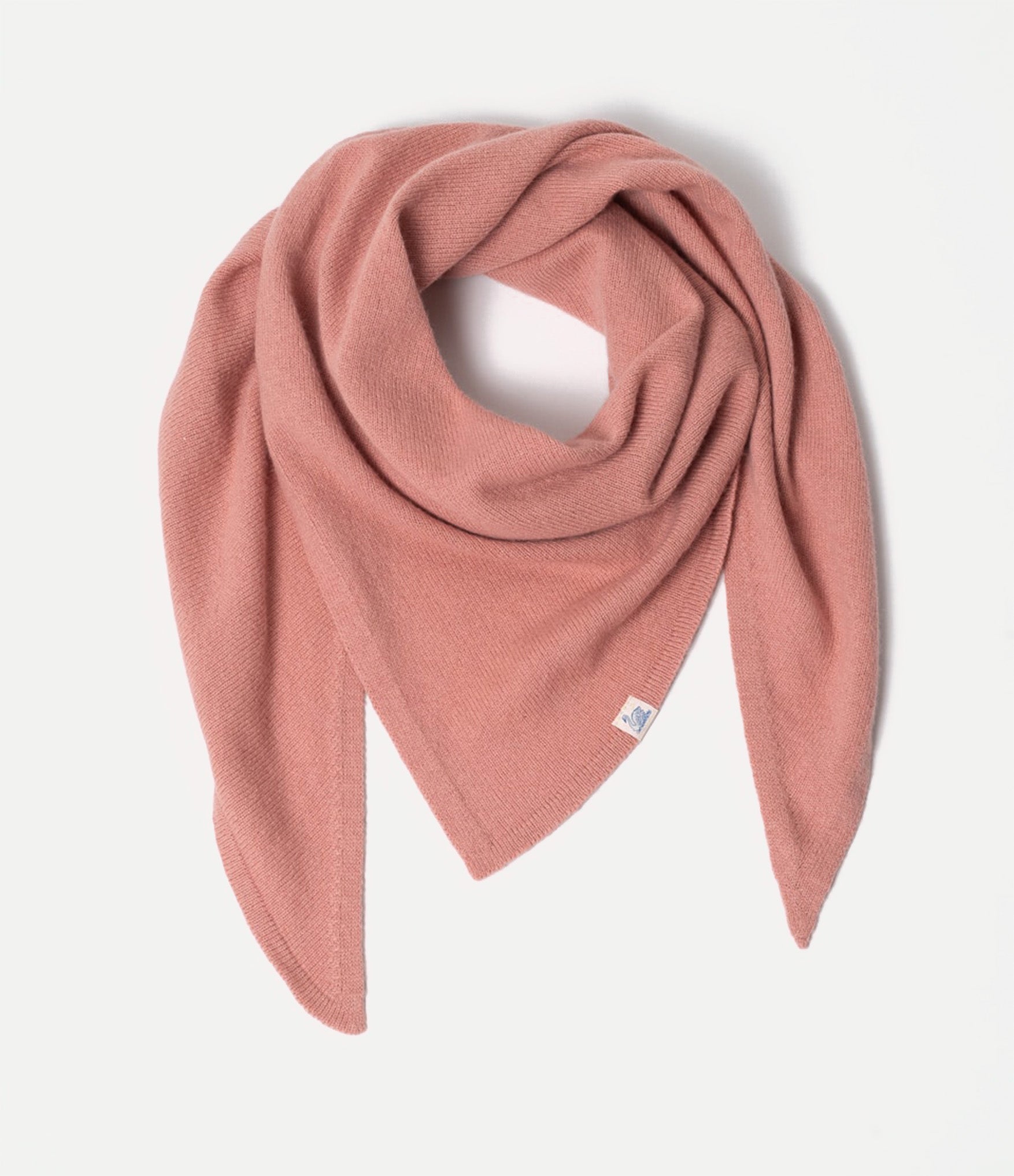 Pink Scarf made of merino wool, silk and cashmere against neutral background