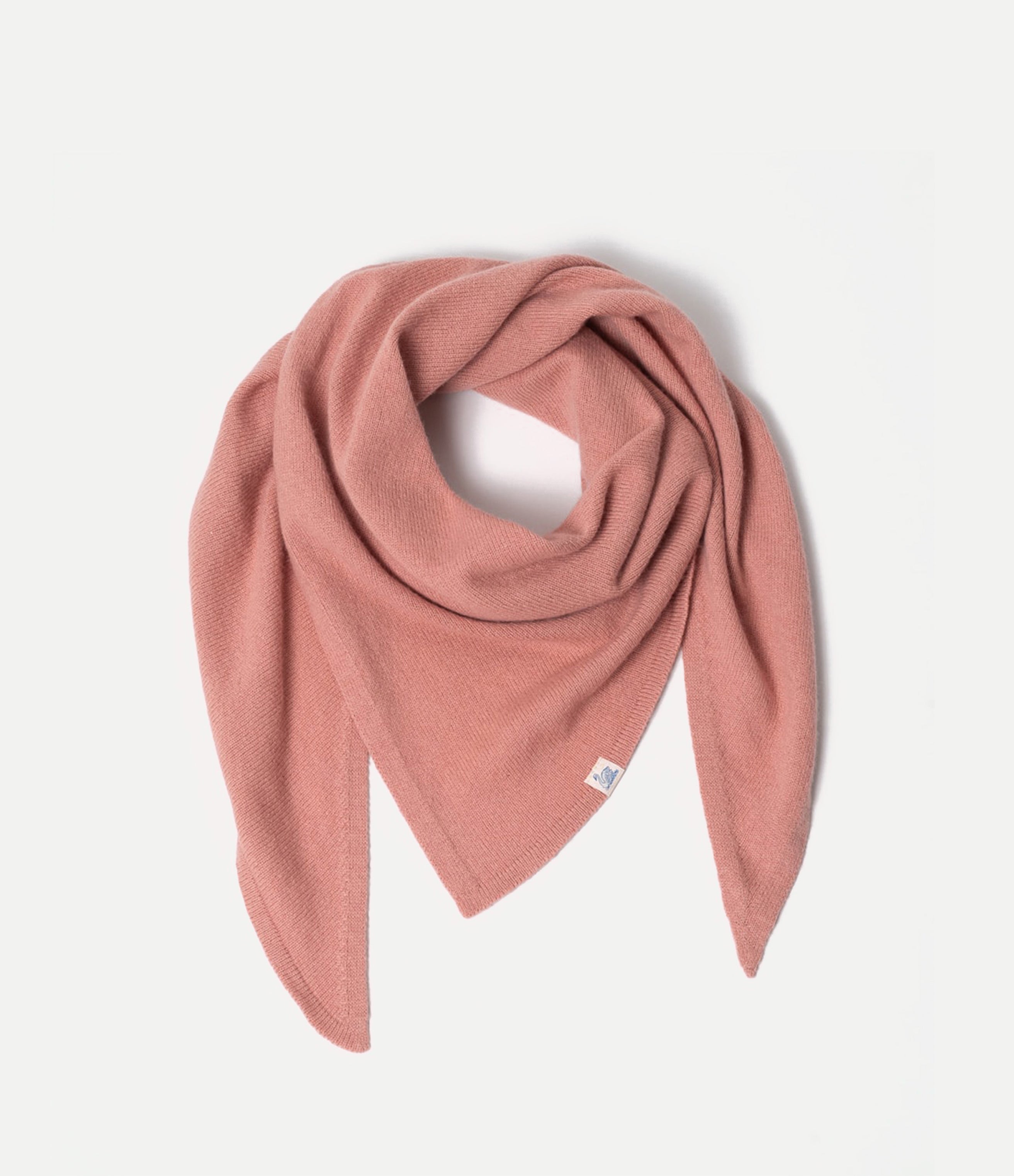 Pink Scarf made of merino wool, silk and cashmere against neutral background