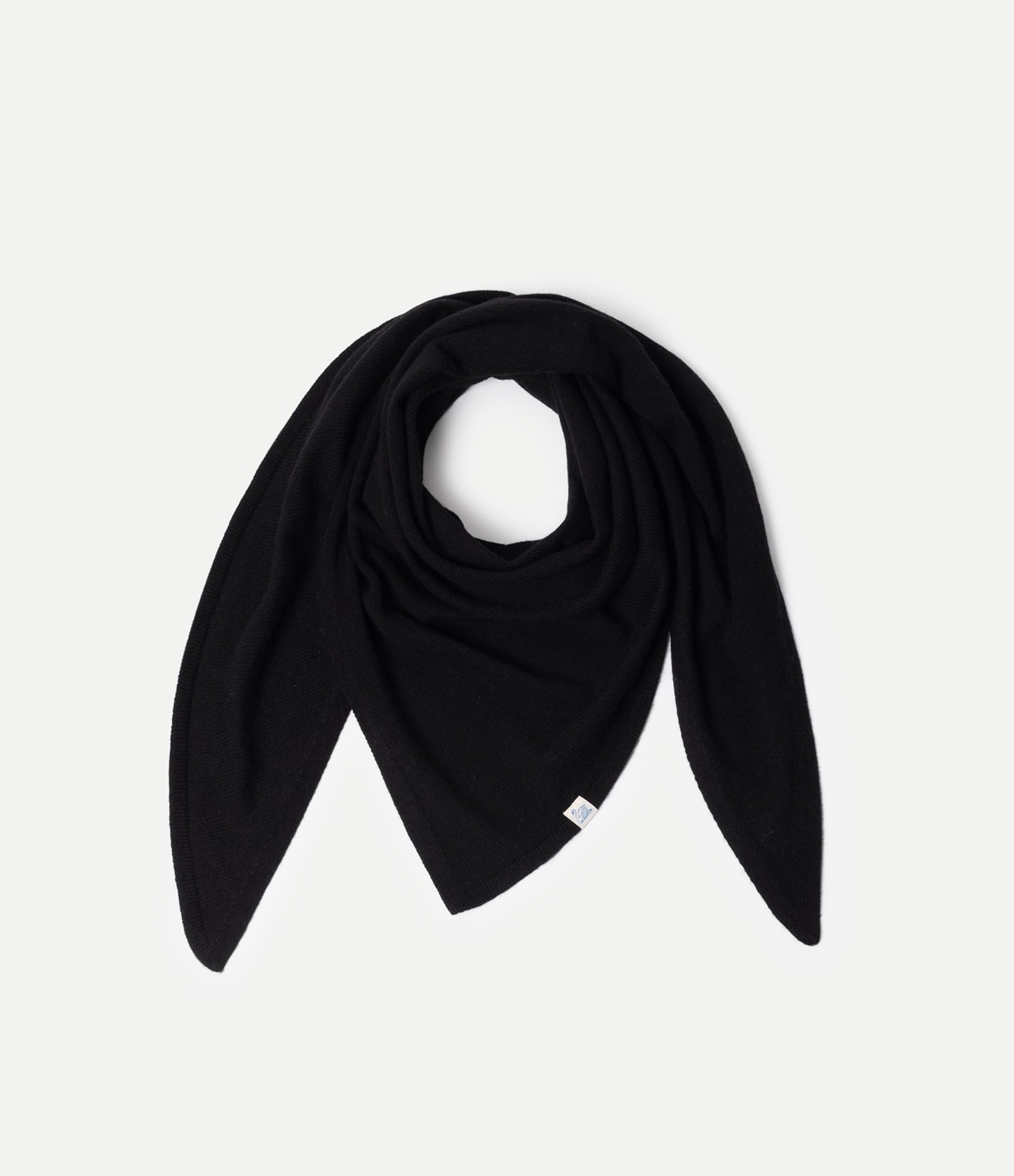 Black Scarf made of merino wool, silk and cashmere against neutral background