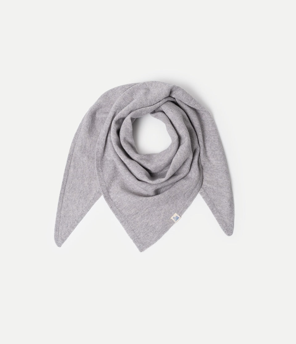 Gray Scarf made of merino wool, silk and cashmere against neutral background