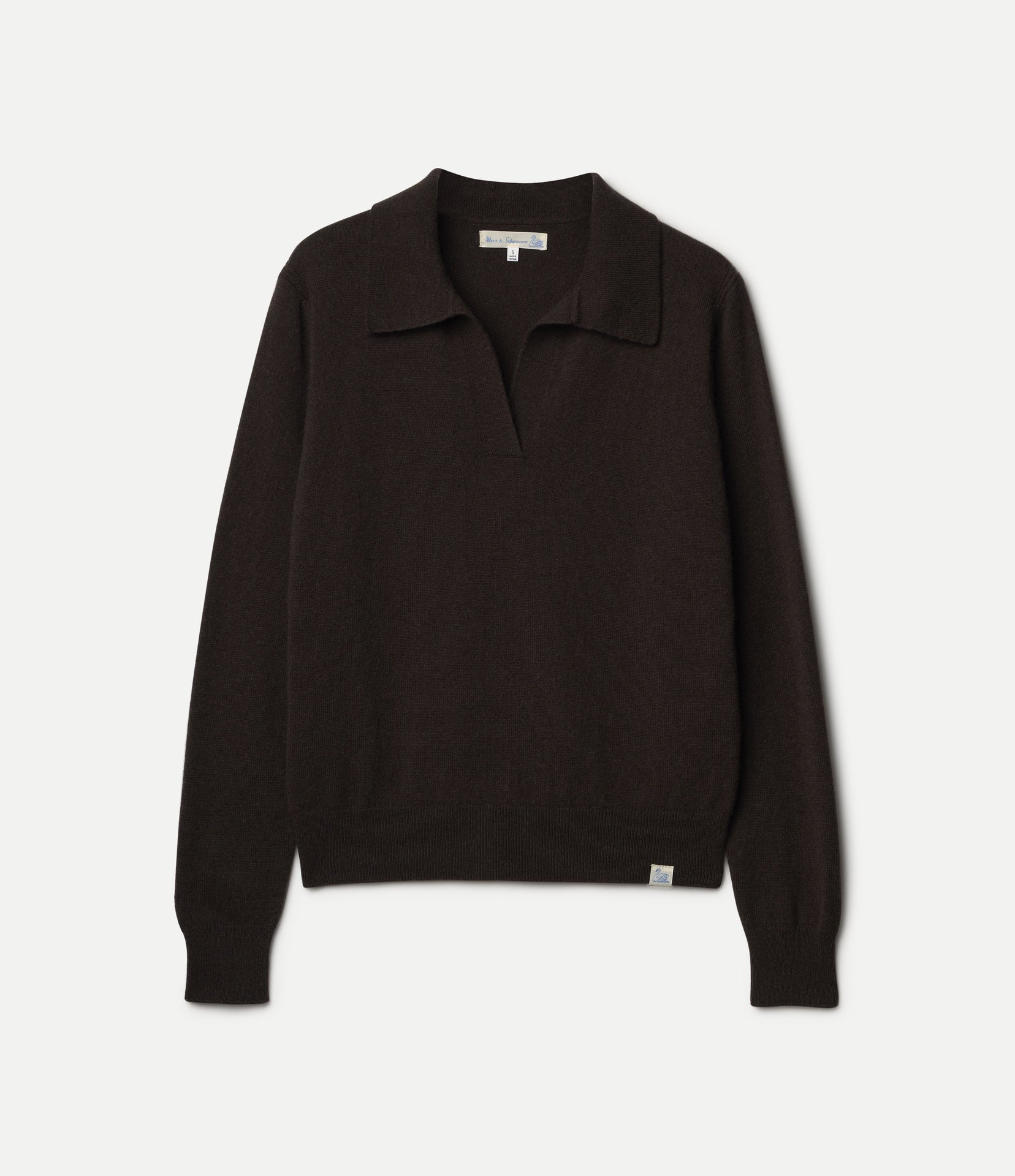 A dark brown long-sleeve knit polo sweater with a collar and a small white brand tag on the bottom hem, displayed against a light gray background.