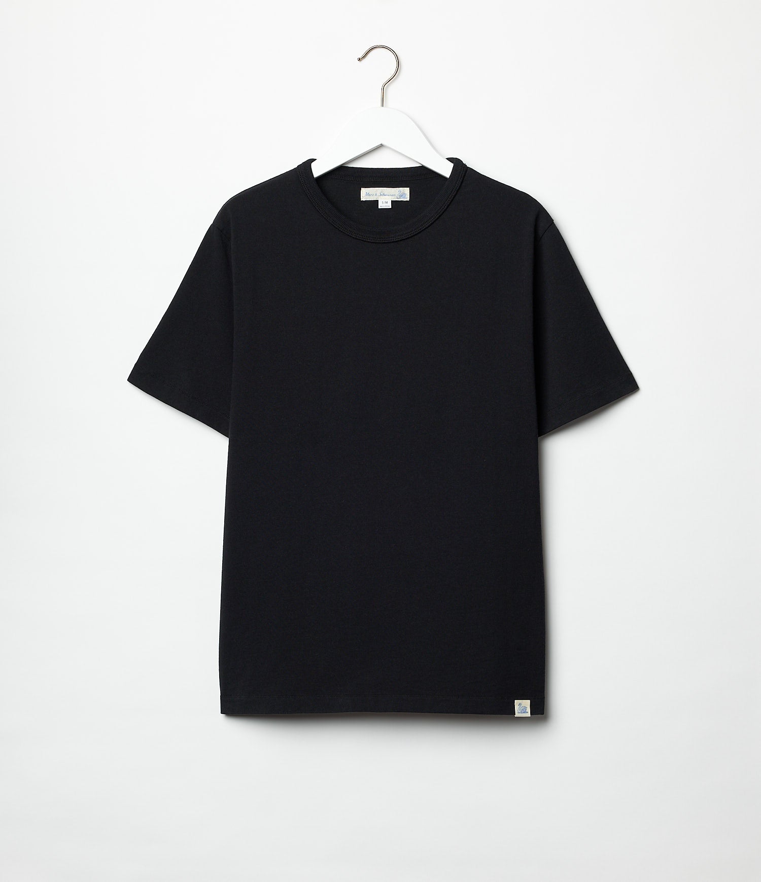 Black classic cotton T-shirt on a hangar