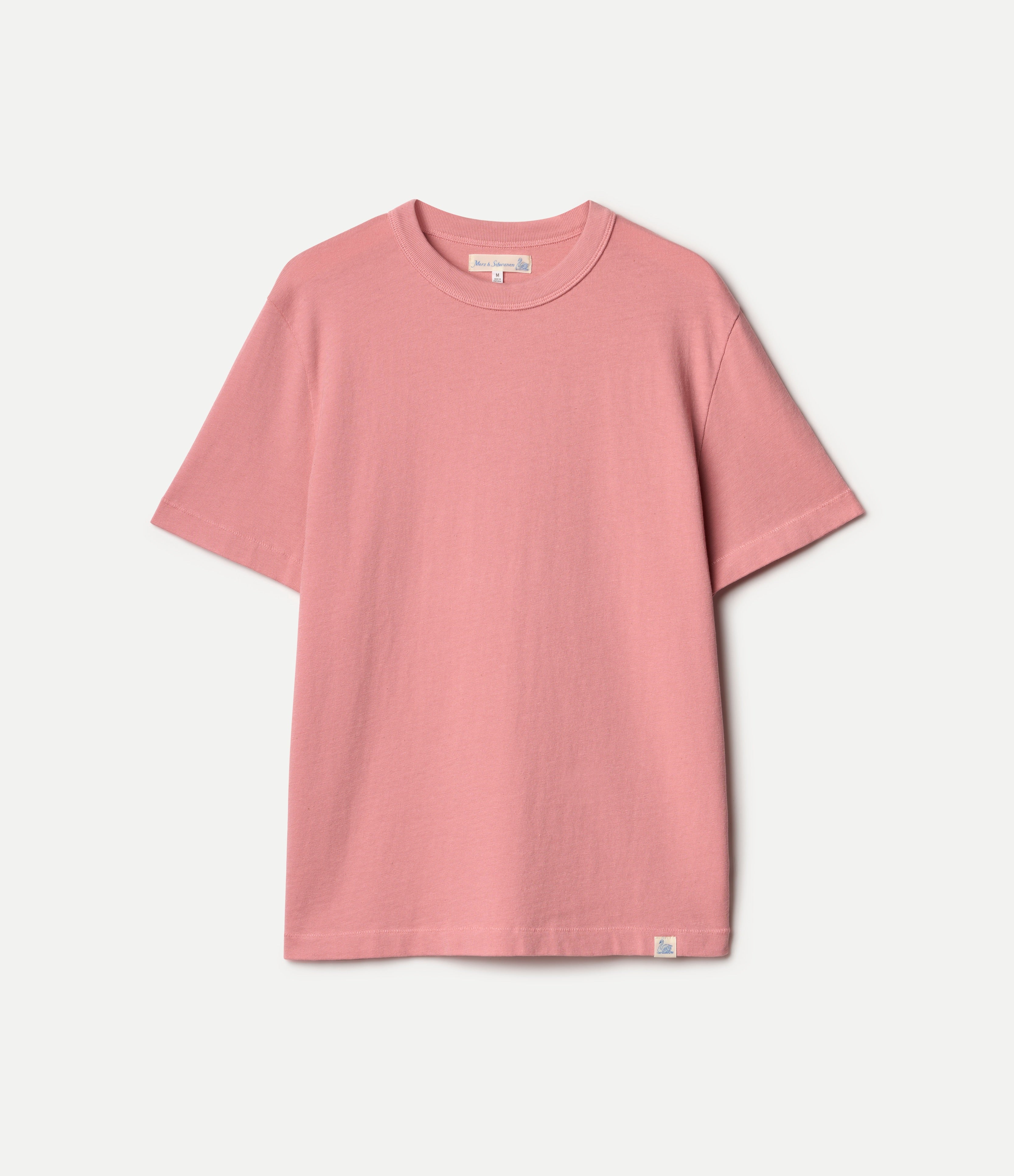Pink authentic jersey t-shirt against a neutral background
