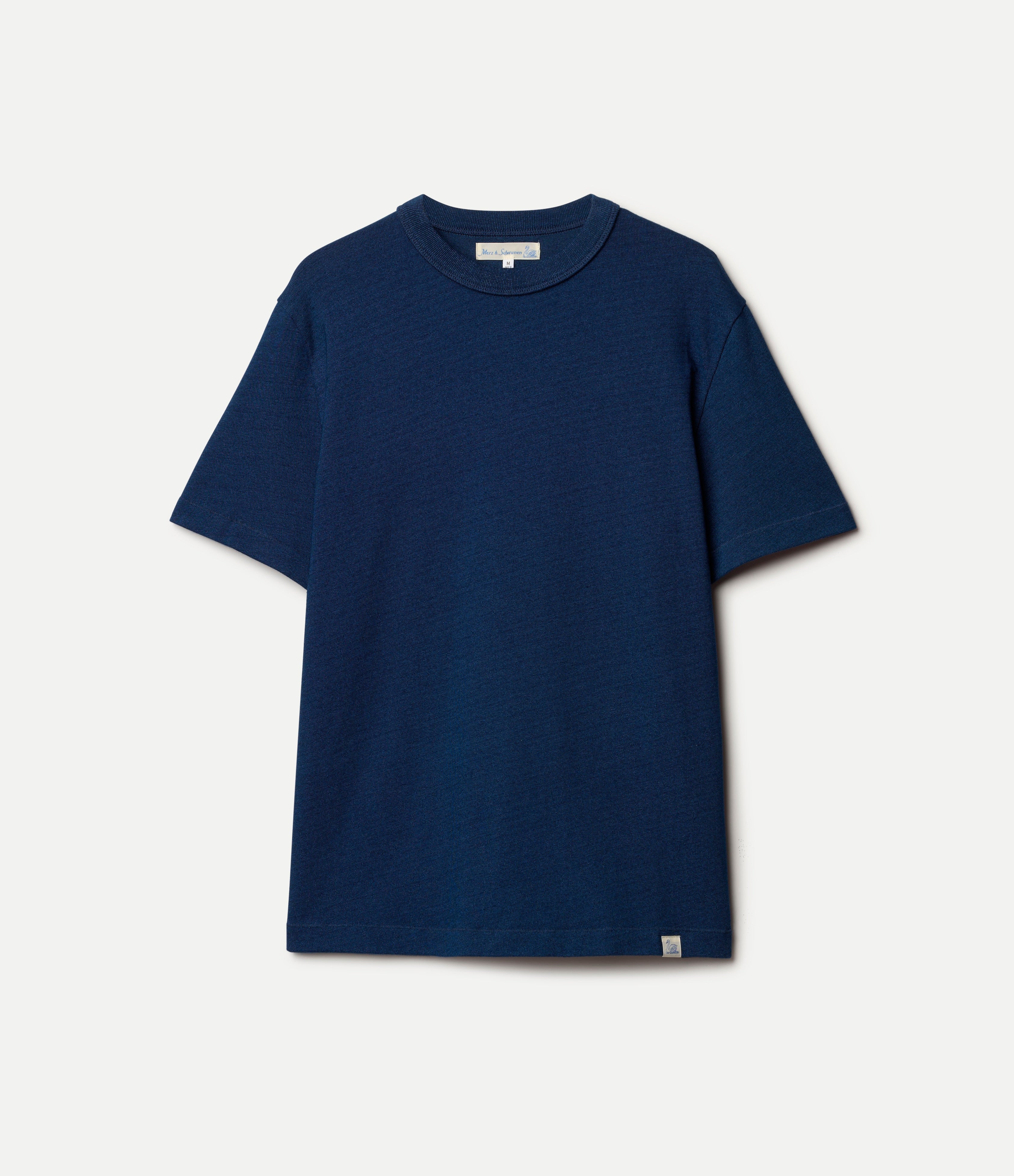 Indigo blue authentic jersey t-shirt on a light gray background