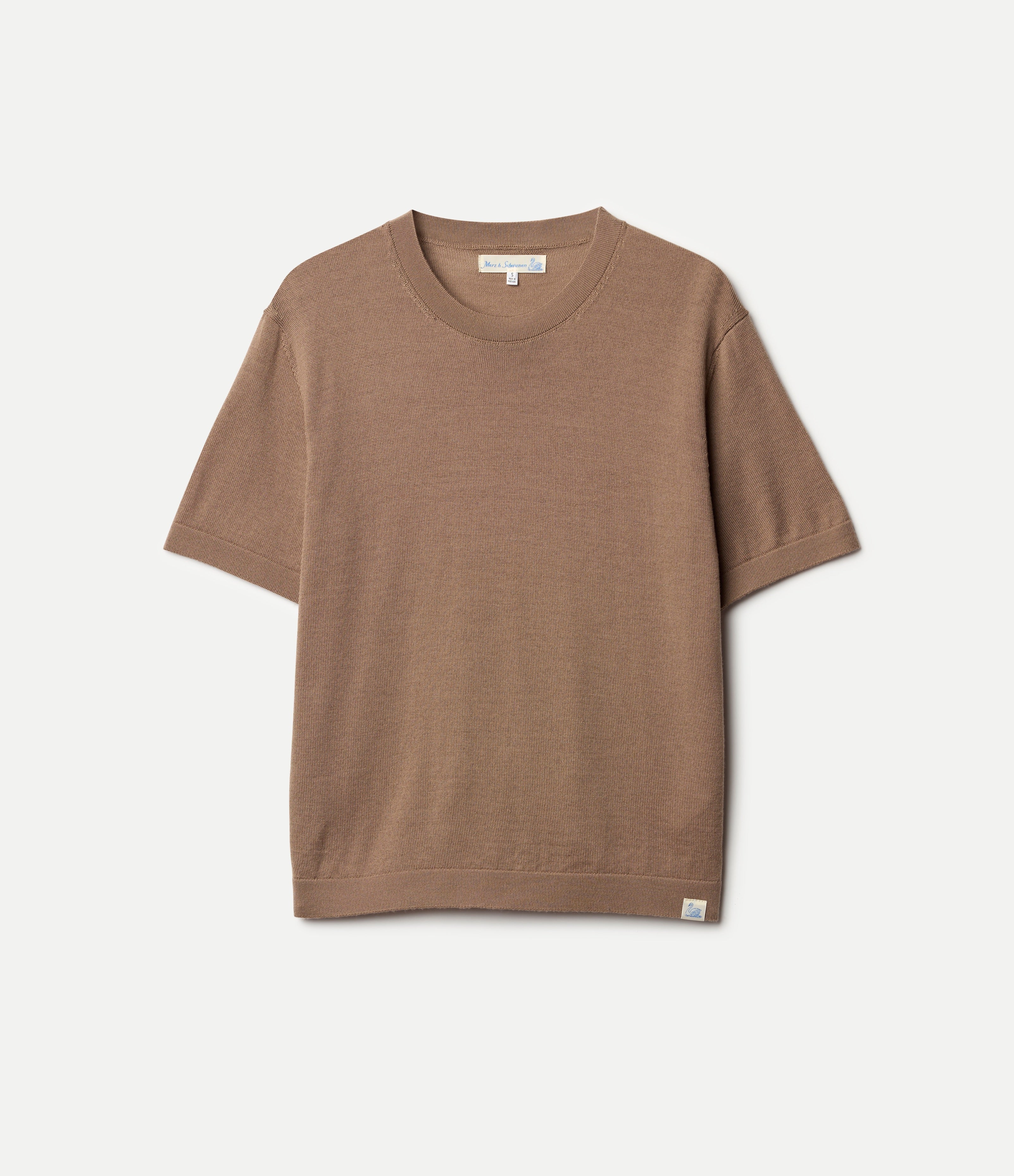 Brown knitted merino wool t-shirt on a light gray background