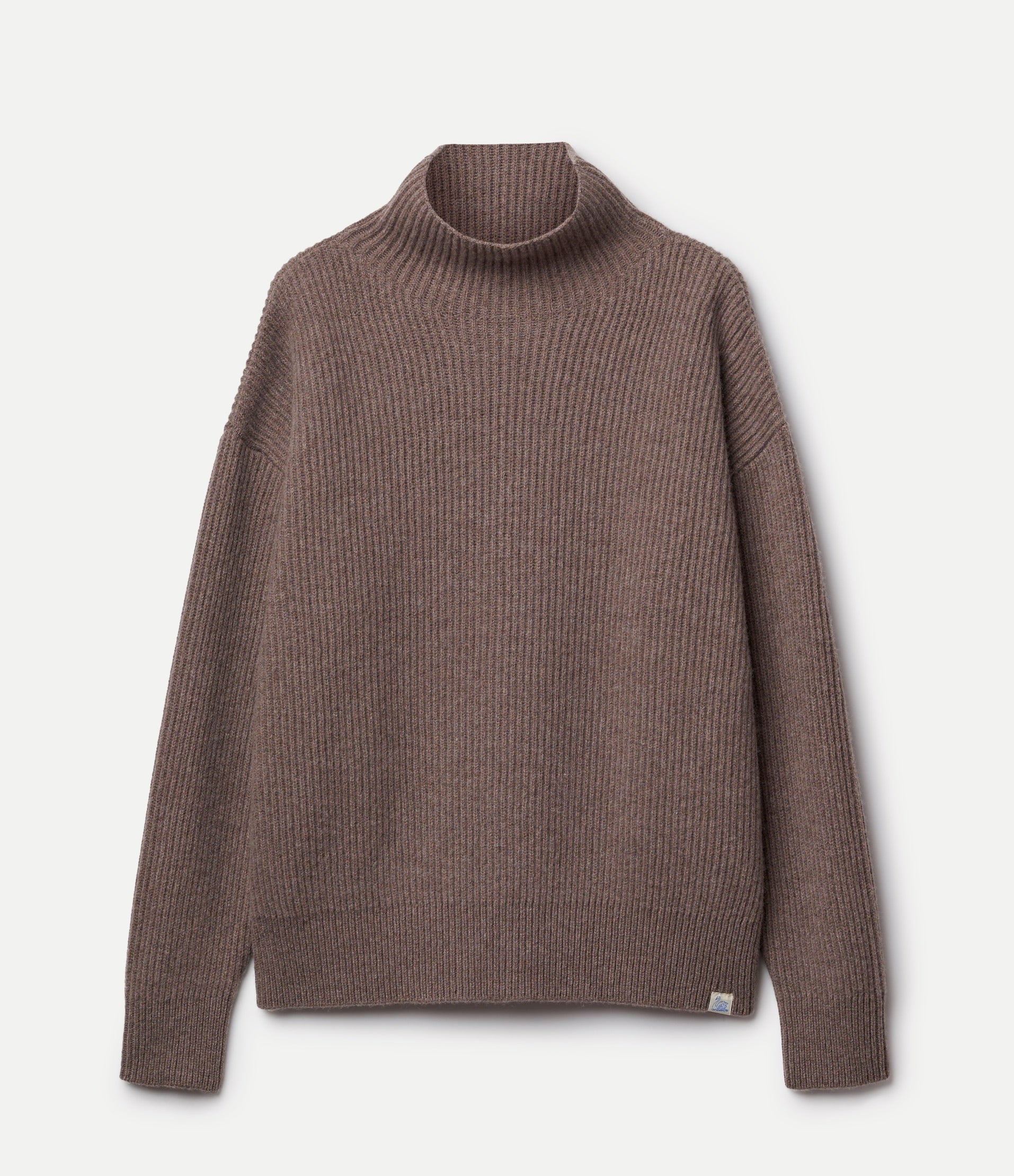 Grey turtleneck sweater on a light gray background