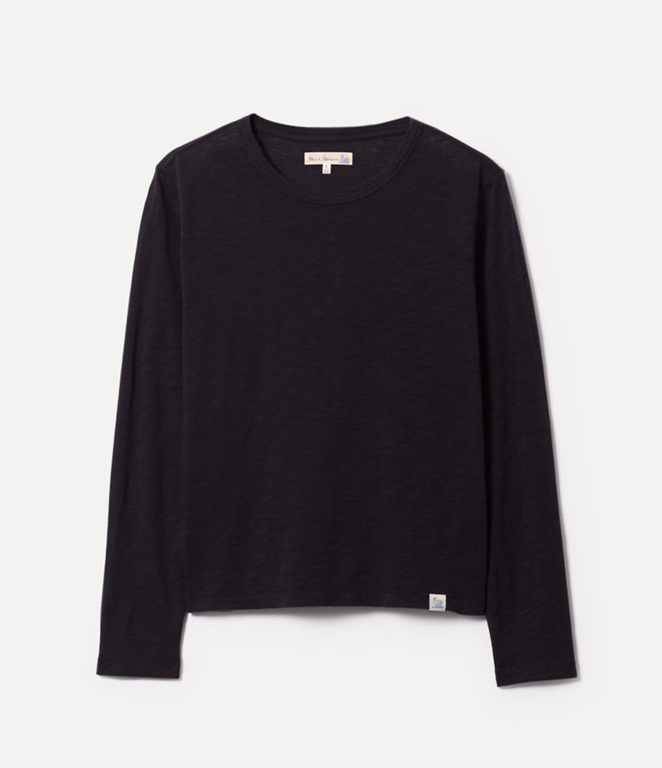 Black long-sleeve shirt on a light gray background