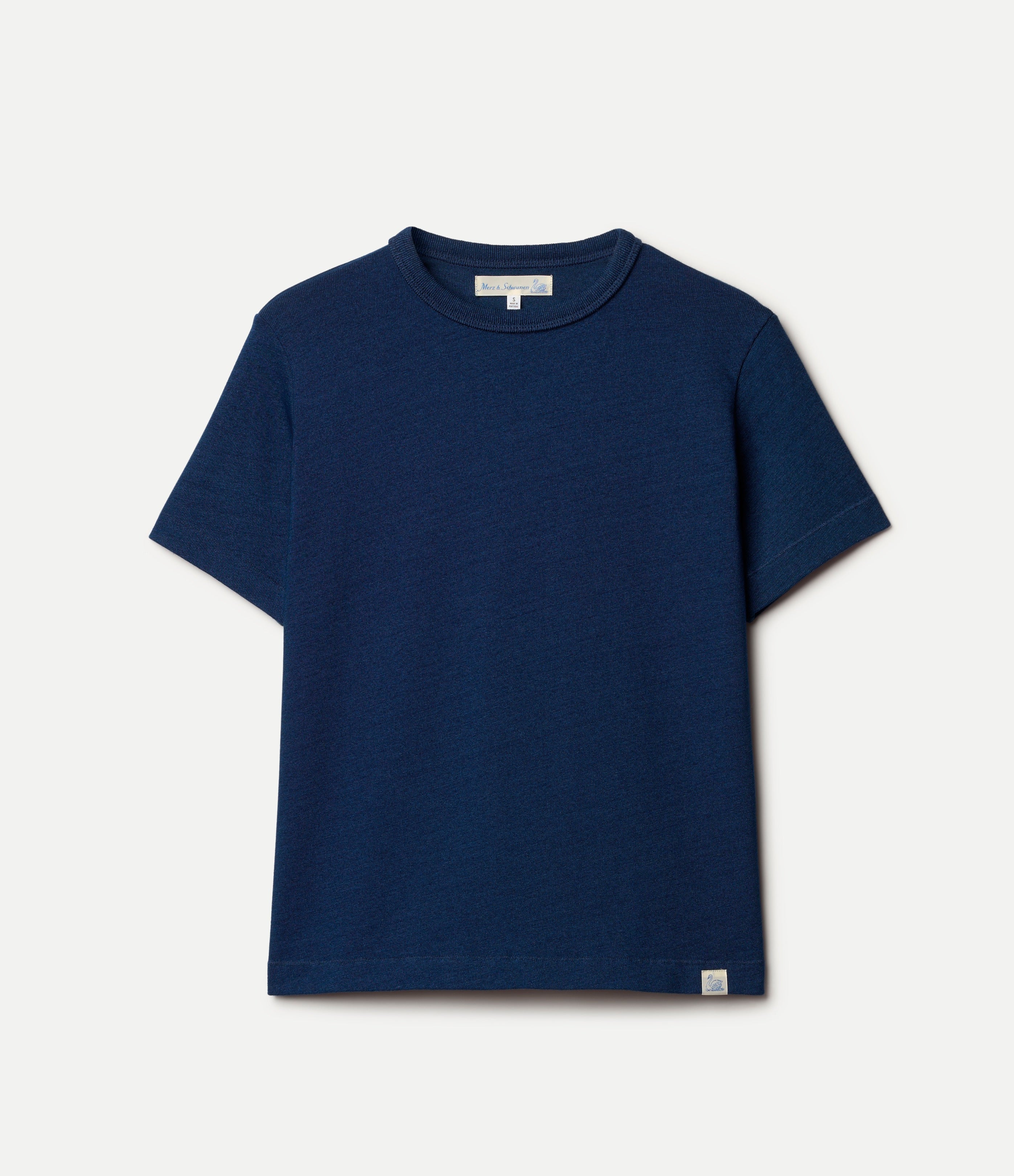 Indigo blue t-shirt on a light gray background
